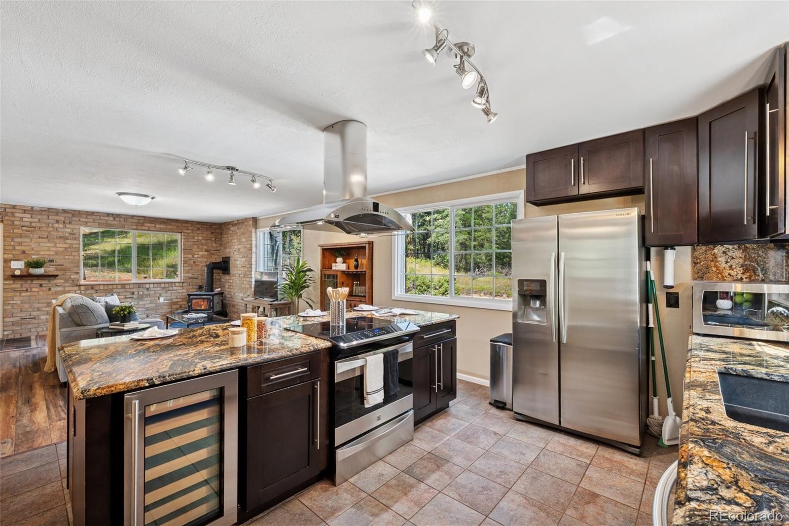 Upper Bear Creek Evergreen Home | MLS #: 9461132264  Whiskey Jay Hill Road, Evergreen Beds: 3 Baths: 2 Price: $850,000