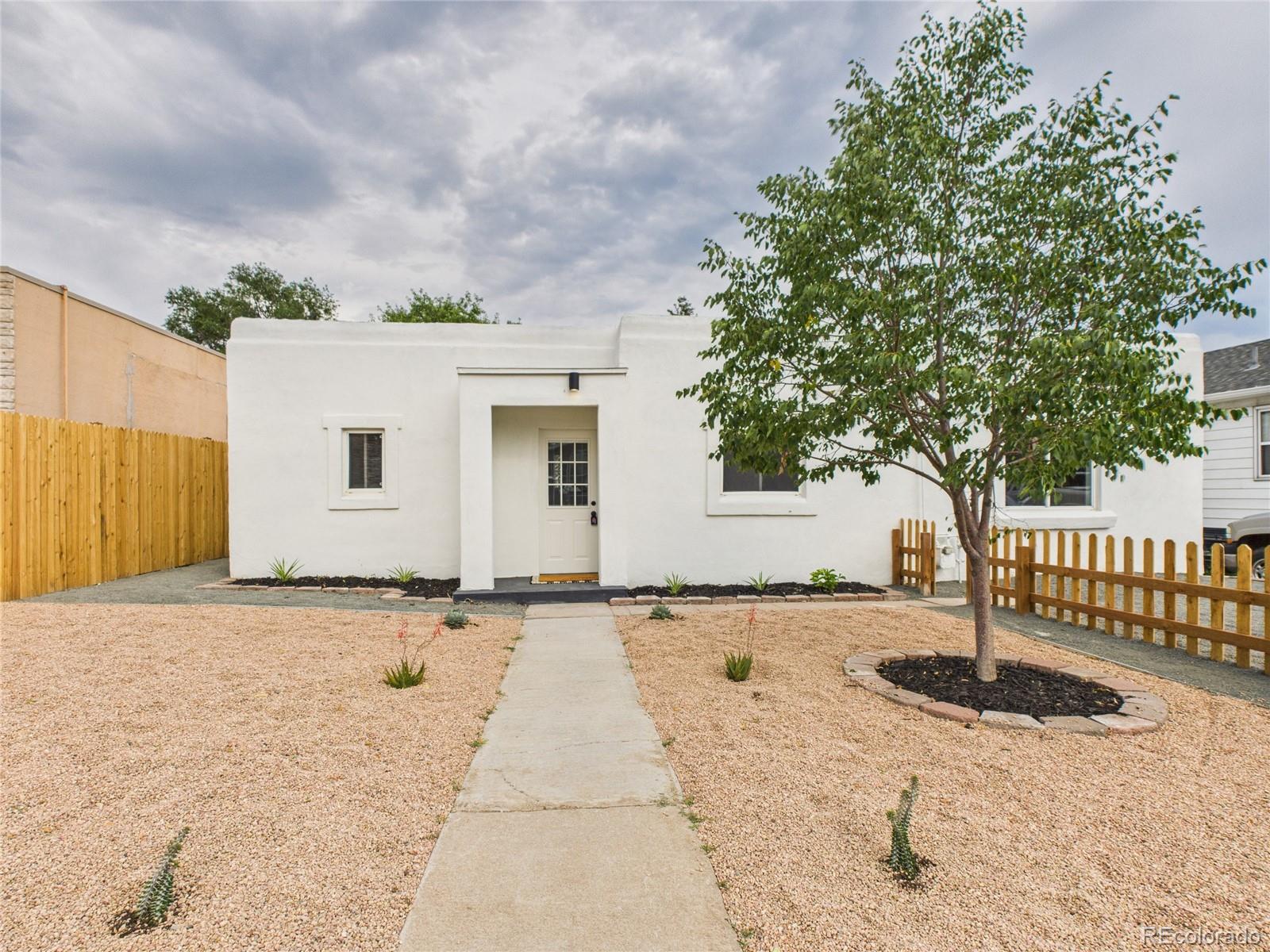 Kentucky Gardens Denver Home | MLS #: 22015601060 S Quitman Street, Denver Beds: 2 Baths: 2 Price: $450,000