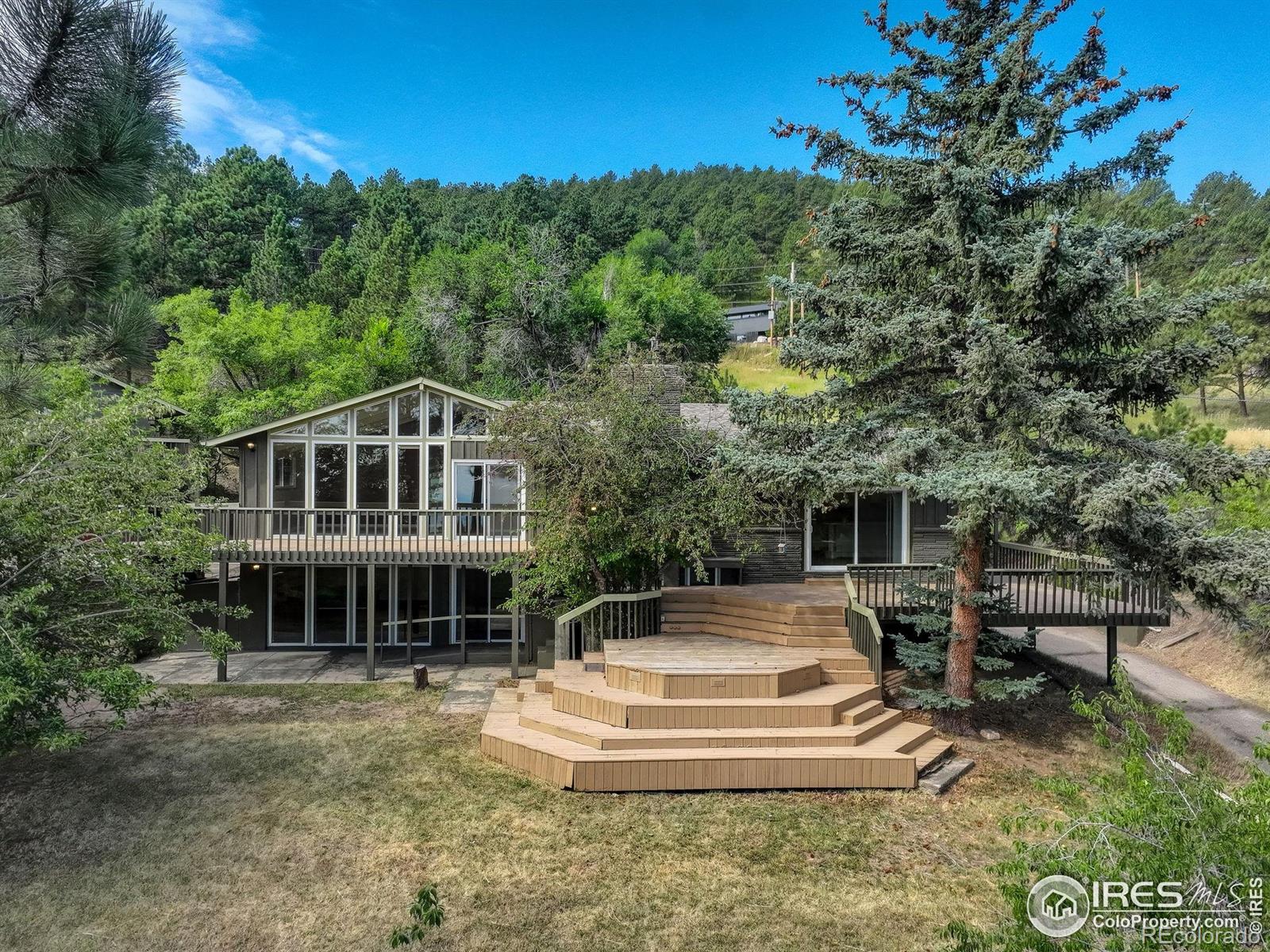 Pine Brook Hills Boulder Home | MLS #: 45678910410771629  Timber Lane, Boulder Beds: 4 Baths: 3 Price: $1,195,000