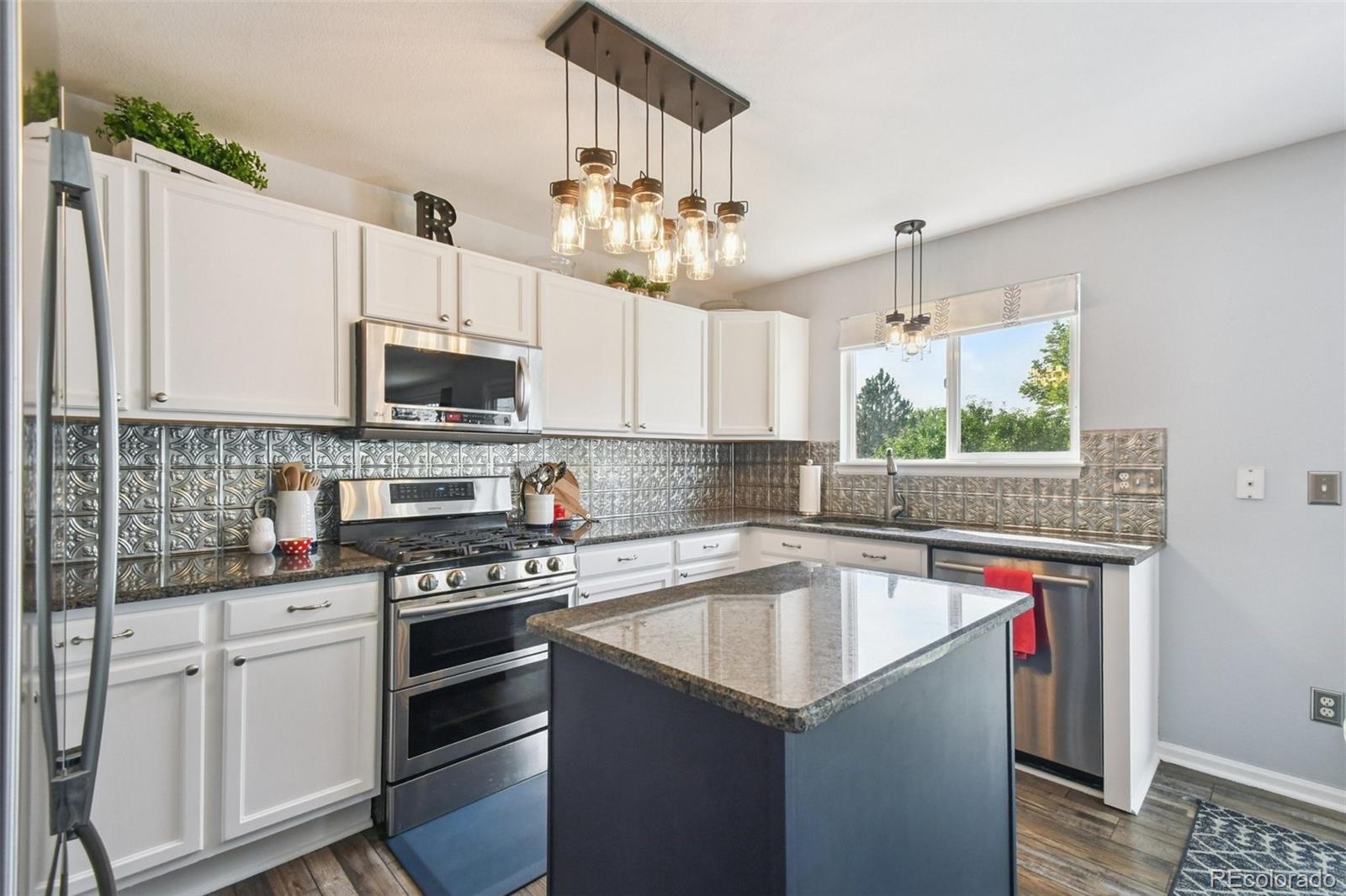 Saddle Rock Ridge Aurora Home | MLS #: 39447025691 S Versailles Street, Aurora Beds: 4 Baths: 3 Price: $540,000