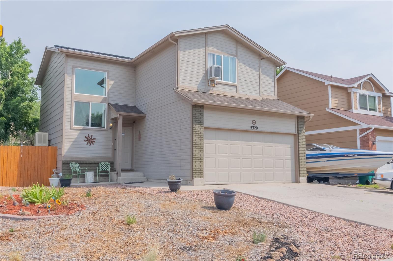 Sundown Colorado Springs Home | MLS #: 55954265320  Tupper Court, Colorado Springs Beds: 4 Baths: 3 Price: $420,000