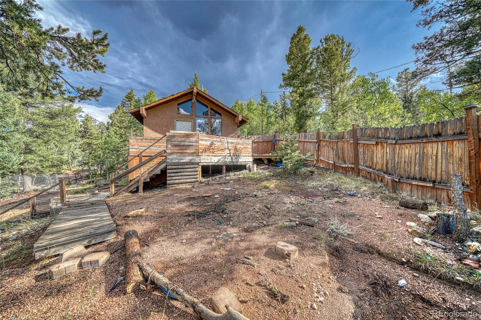 Whispering Pines Florissant Home | MLS #: 4157420747  Trout Haven Road, Florissant Beds: 1 Baths: 1 Price: $140,000