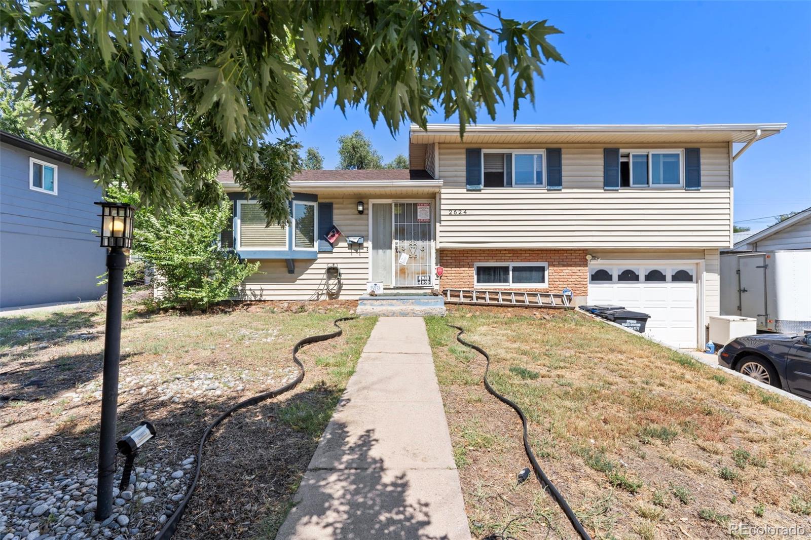 Smartts Colorado Springs Home | MLS #: 93754732624  Weir Avenue, Colorado Springs Beds: 3 Baths: 3 Price: $330,000