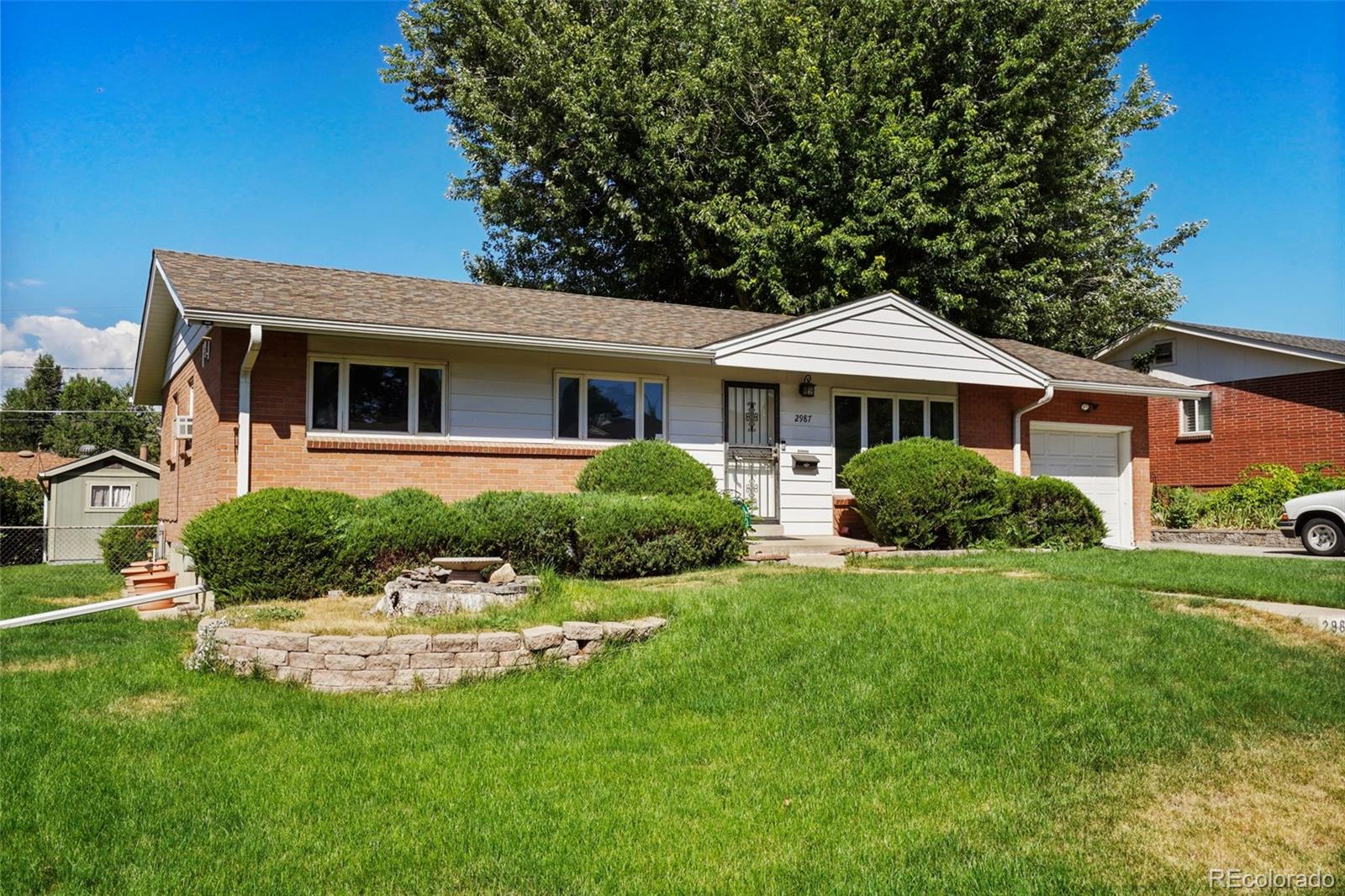 Harvey Park Denver Home | MLS #: 86349852987 S Stuart Street, Denver Beds: 4 Baths: 2 Price: $499,000