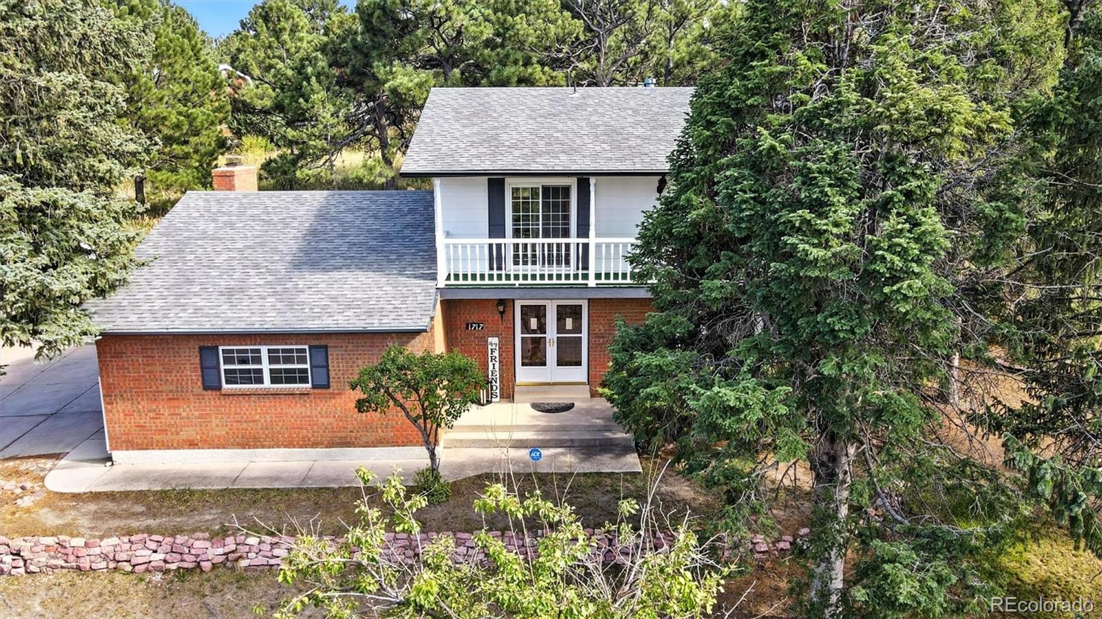 Rustic Hills Colorado Springs Home | MLS #: 94652531717  Van Diest Road, Colorado Springs Beds: 5 Baths: 4 Price: $499,900