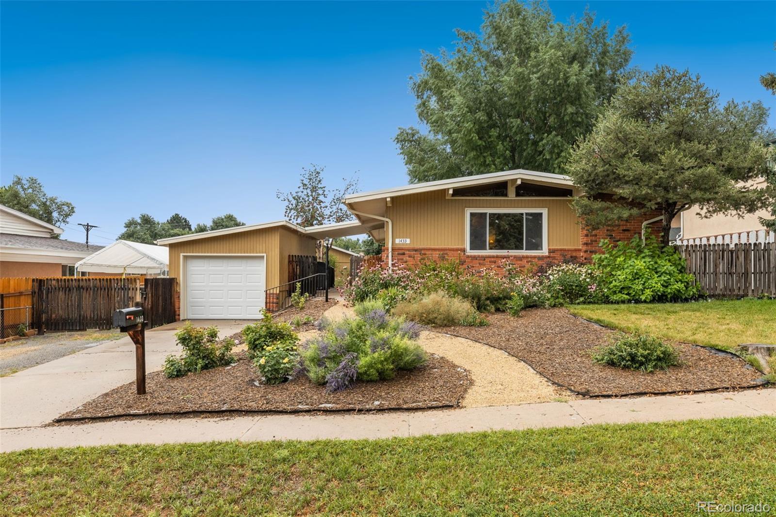 East Junior Heights Colorado Springs Home | MLS #: 33927911433  Tweed Street, Colorado Springs Beds: 4 Baths: 2 Price: $449,000