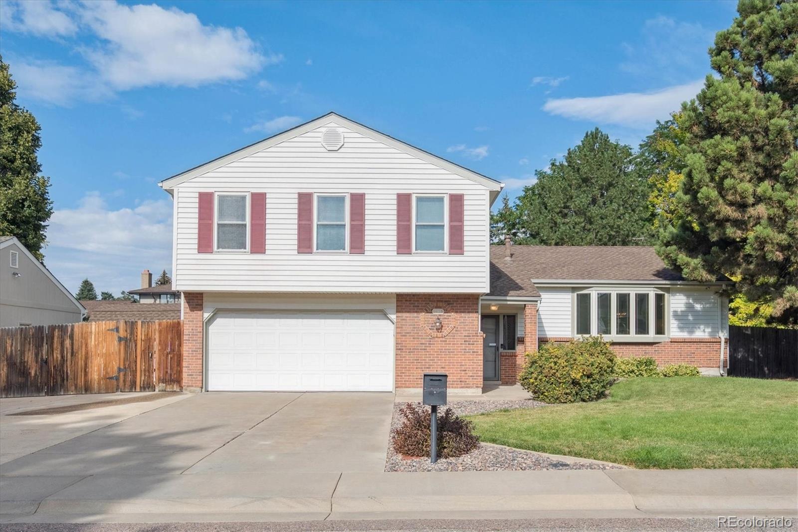 Oak Park Arvada Home | MLS #: 22386197765  Parfet Street, Arvada Beds: 4 Baths: 3 Price: $675,000