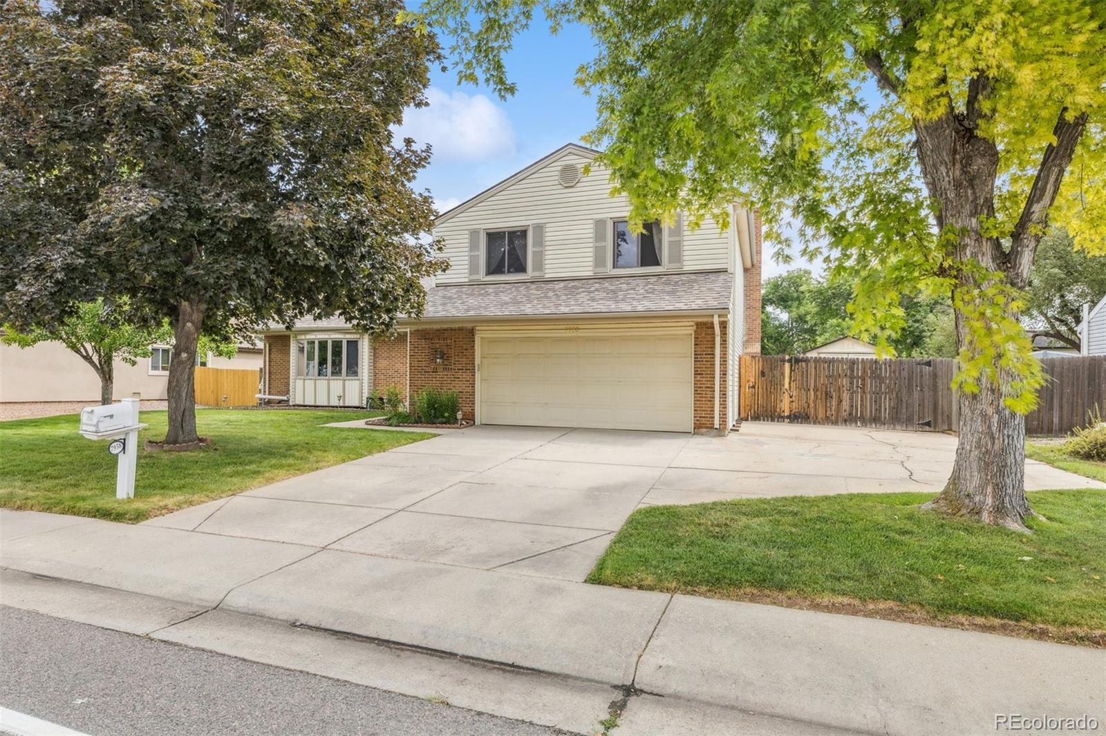 Oak Park Arvada Home | MLS #: 25942687958  Quail , Arvada Beds: 4 Baths: 3 Price: $695,000