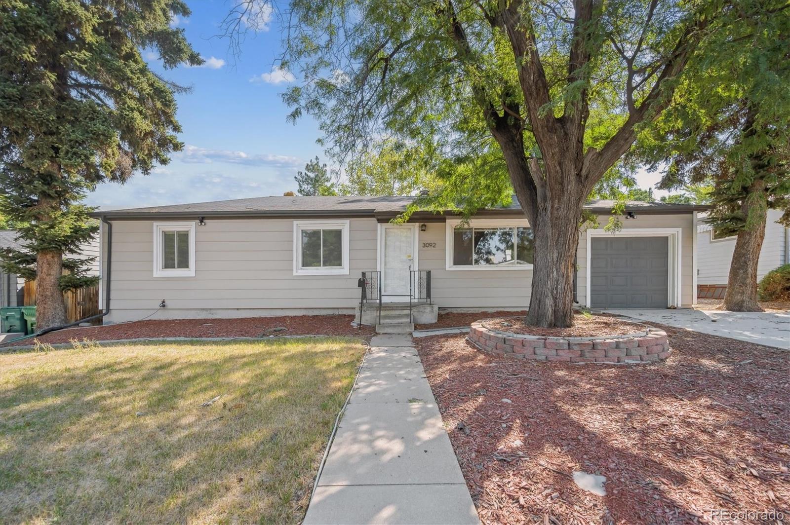 Holly Hills Denver Home | MLS #: 21586323092 S Kearney Street, Denver Beds: 4 Baths: 3 Price: $575,000