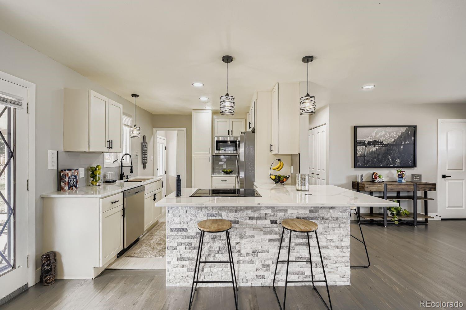 Vistas Denver Home | MLS #: 52308997371  Bronco Road, Denver Beds: 4 Baths: 2 Price: $549,900