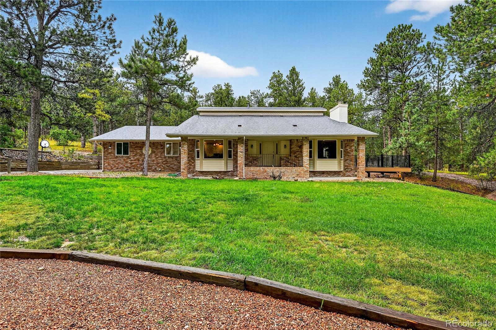 Woodmoor Monument Home | MLS #: 37368281085  Melinda Lane, Monument Beds: 4 Baths: 4 Price: $899,000