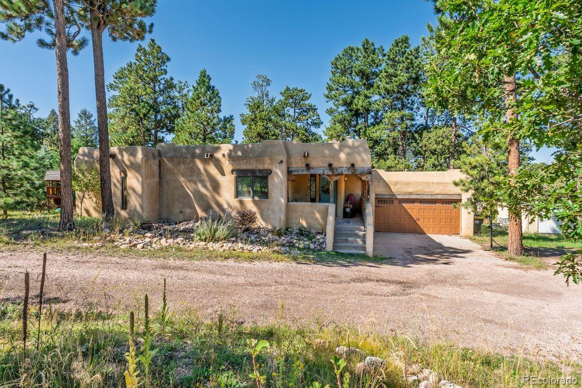 Woodmoor Monument Home | MLS #: 370737318918  Cypress Point , Monument Beds: 4 Baths: 3 Price: $549,000