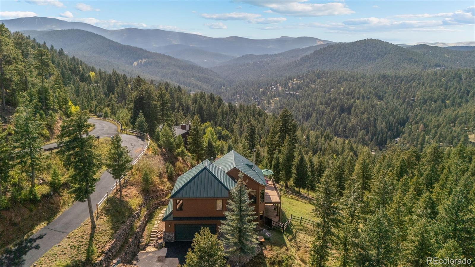 Cragmont Evergreen Home | MLS #: 424132629541  Falcon Ridge Drive, Evergreen Beds: 3 Baths: 3 Price: $925,000