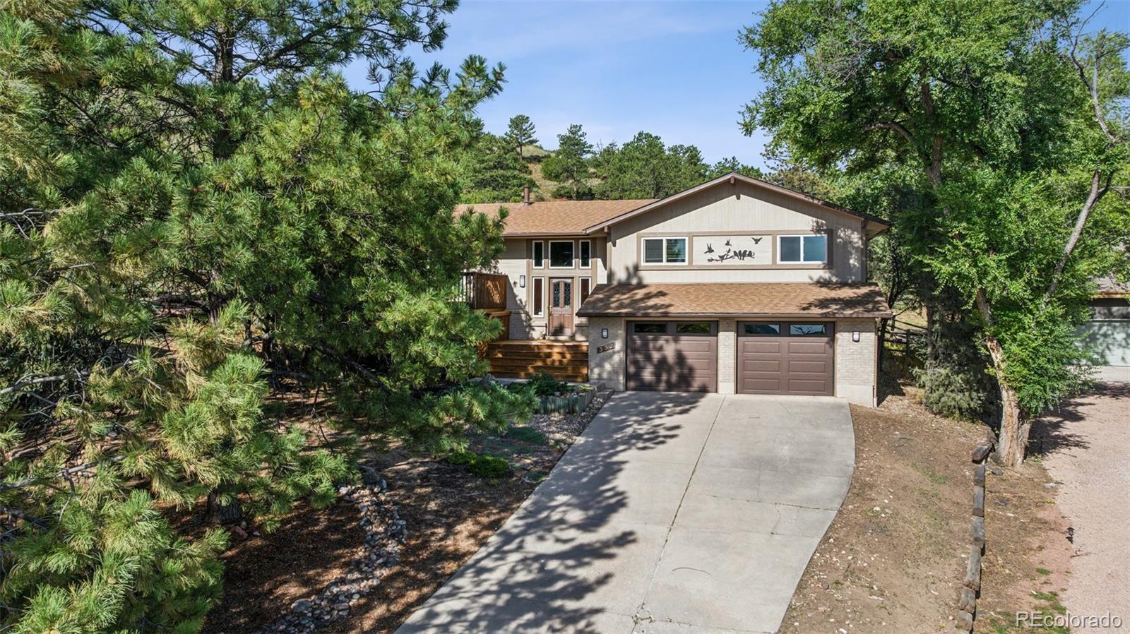 Comstock Village Colorado Springs Home | MLS #: 6904320352  Waco Court, Colorado Springs Beds: 4 Baths: 3 Price: $590,000