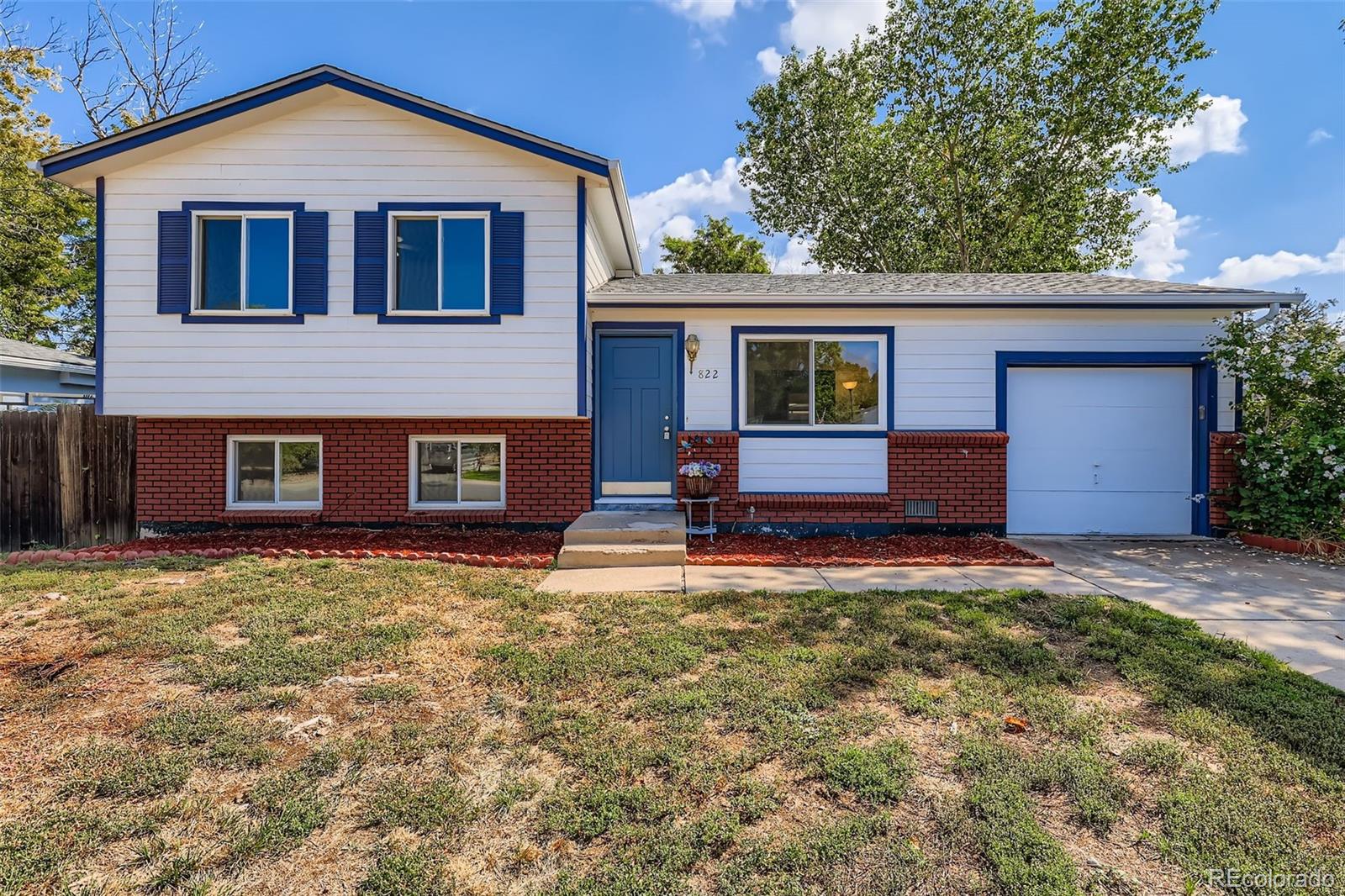Queensborough Aurora Home | MLS #: 4446796822 S Macon Way, Aurora Beds: 4 Baths: 2 Price: $410,000
