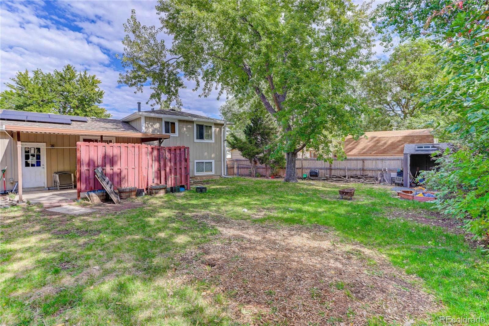 Woods Denver Home | MLS #: 75901781577 S Pierson Street, Denver Beds: 3 Baths: 2 Price: $518,000