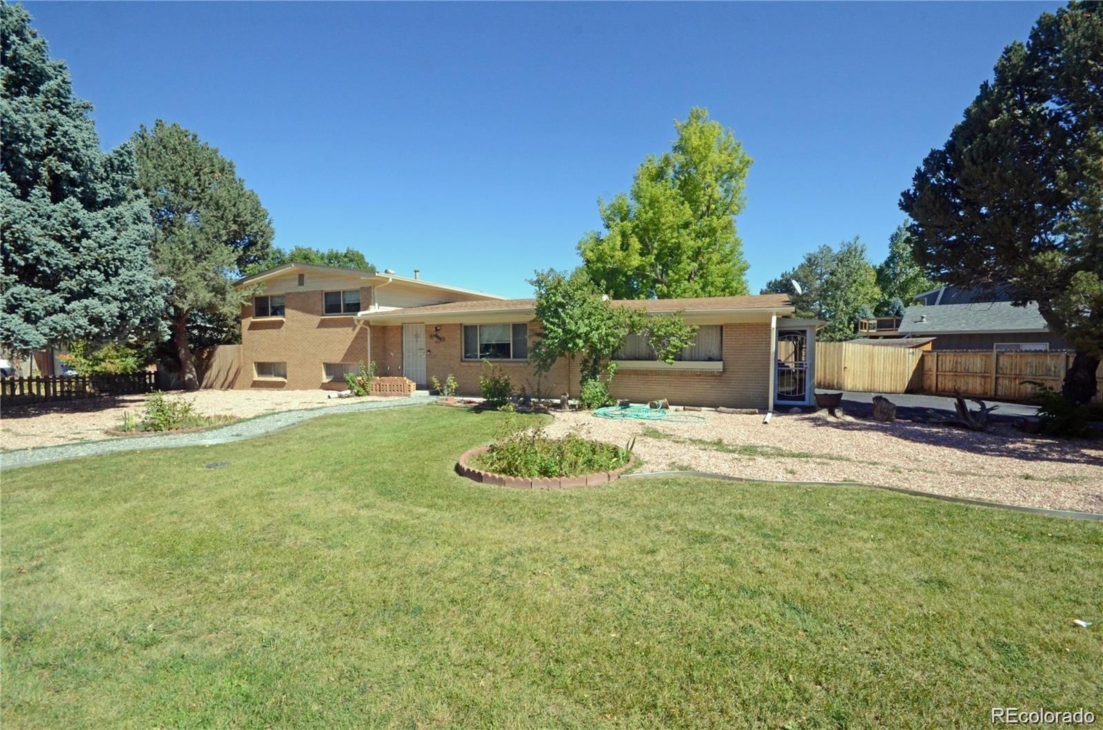 Glennon Heights Lakewood Home | MLS #: 5394076580 S Parfet Street, Lakewood Beds: 4 Baths: 2 Price: $699,000