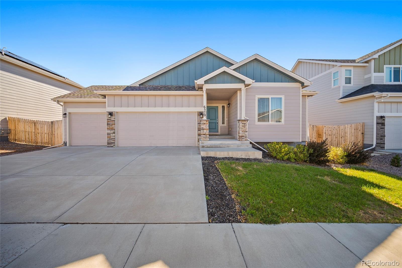 Lorson Ranch Colorado Springs Home | MLS #: 83086996579  Lamine Drive, Colorado Springs Beds: 5 Baths: 3 Price: $475,000