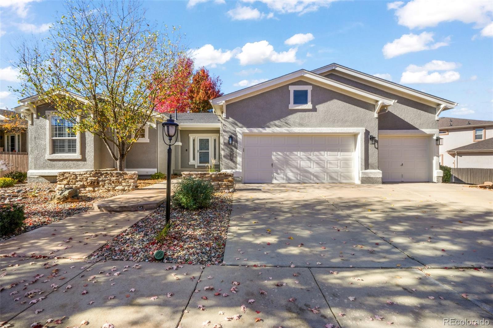 Pine Creek Colorado Springs Home | MLS #: 36432473215  Hollycrest Drive, Colorado Springs Beds: 5 Baths: 3 Price: $799,900