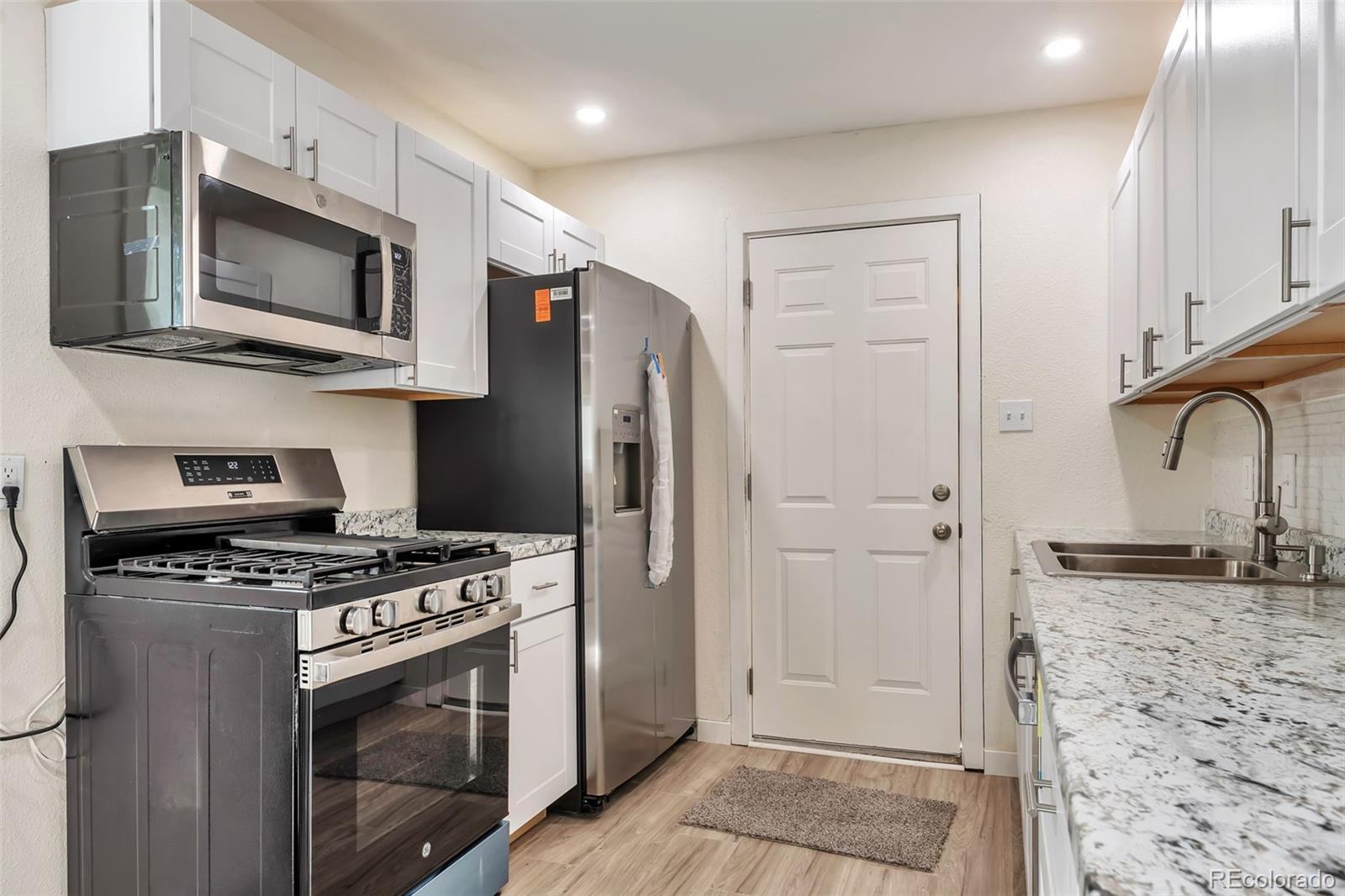 Range View Commerce City Home | MLS #: 33994747761  Kearney Drive, Commerce City Beds: 4 Baths: 2 Price: $379,900