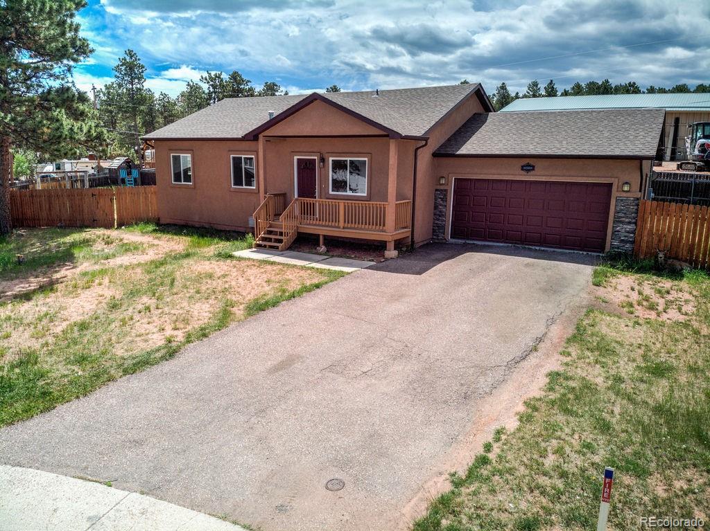 Pacesetter Woodland Park Home | MLS #: 7032721661  Calico Court, Woodland Park Beds: 5 Baths: 3 Price: $450,000