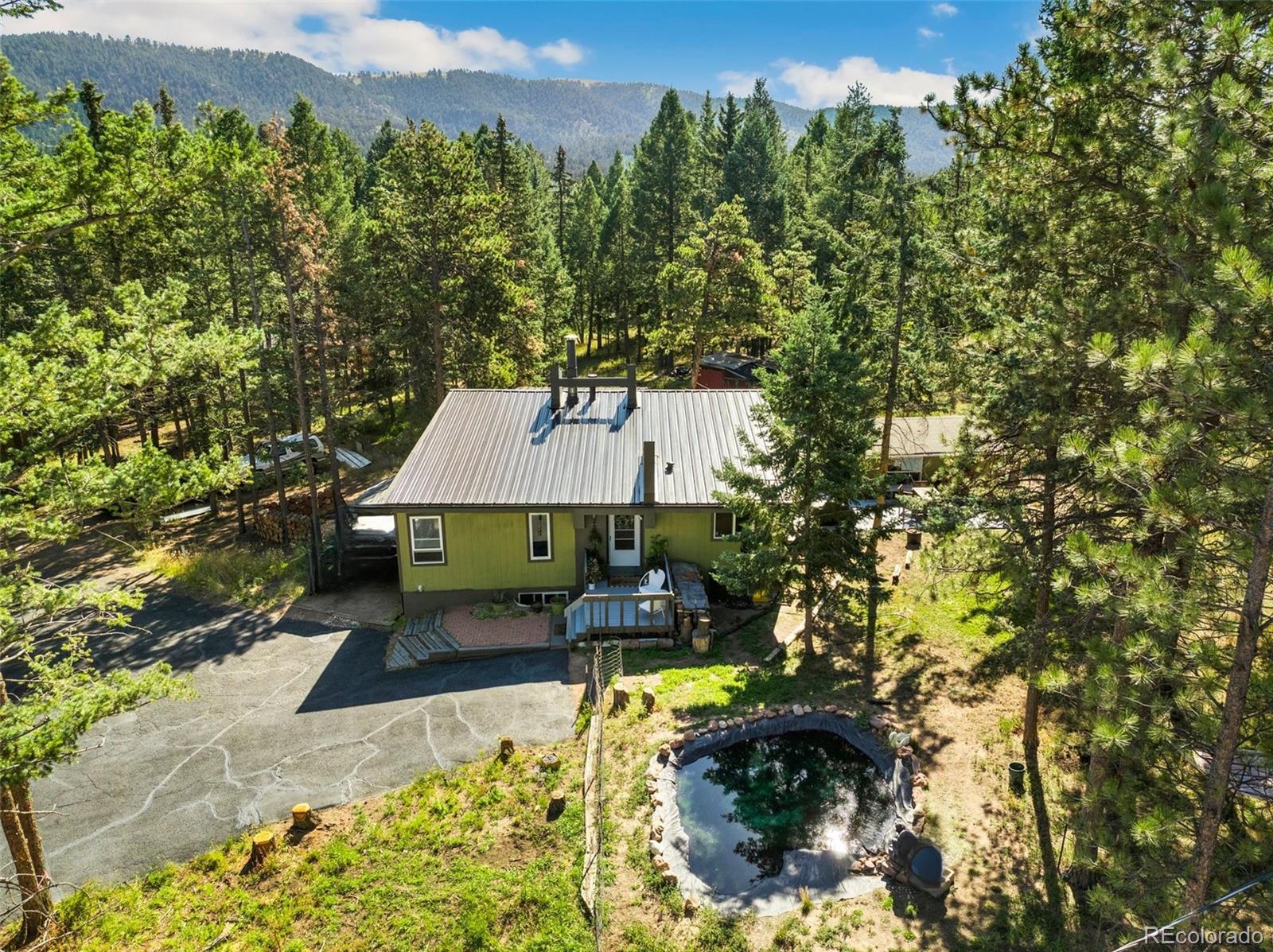 Sunnyslope Woodland Park Home | MLS #: 7359757123  Saddle Drive, Woodland Park Beds: 3 Baths: 2 Price: $579,900