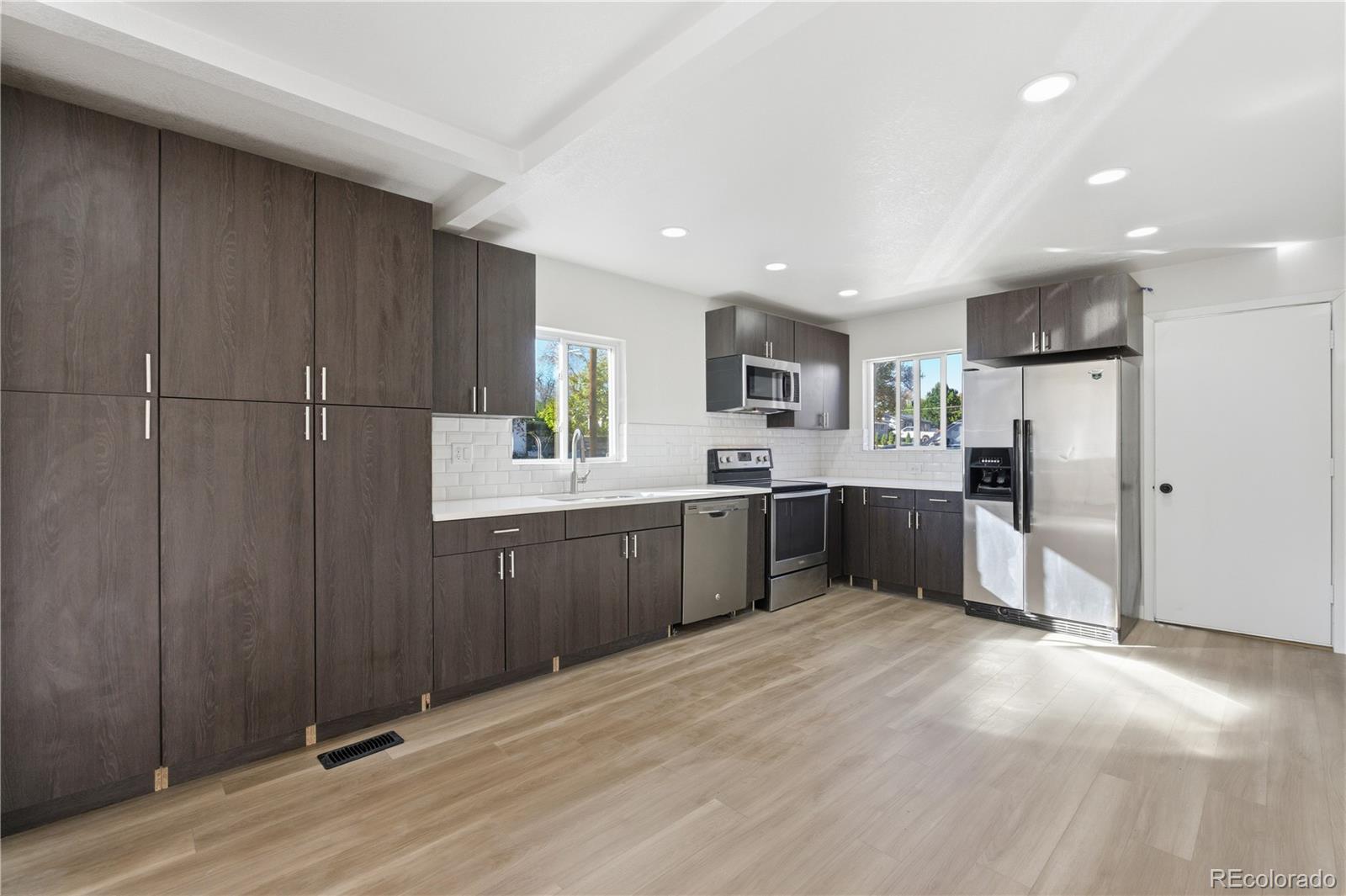 Sheridan Manor Denver Home | MLS #: 34879081550 S Xavier Street, Denver Beds: 4 Baths: 3 Price: $495,000