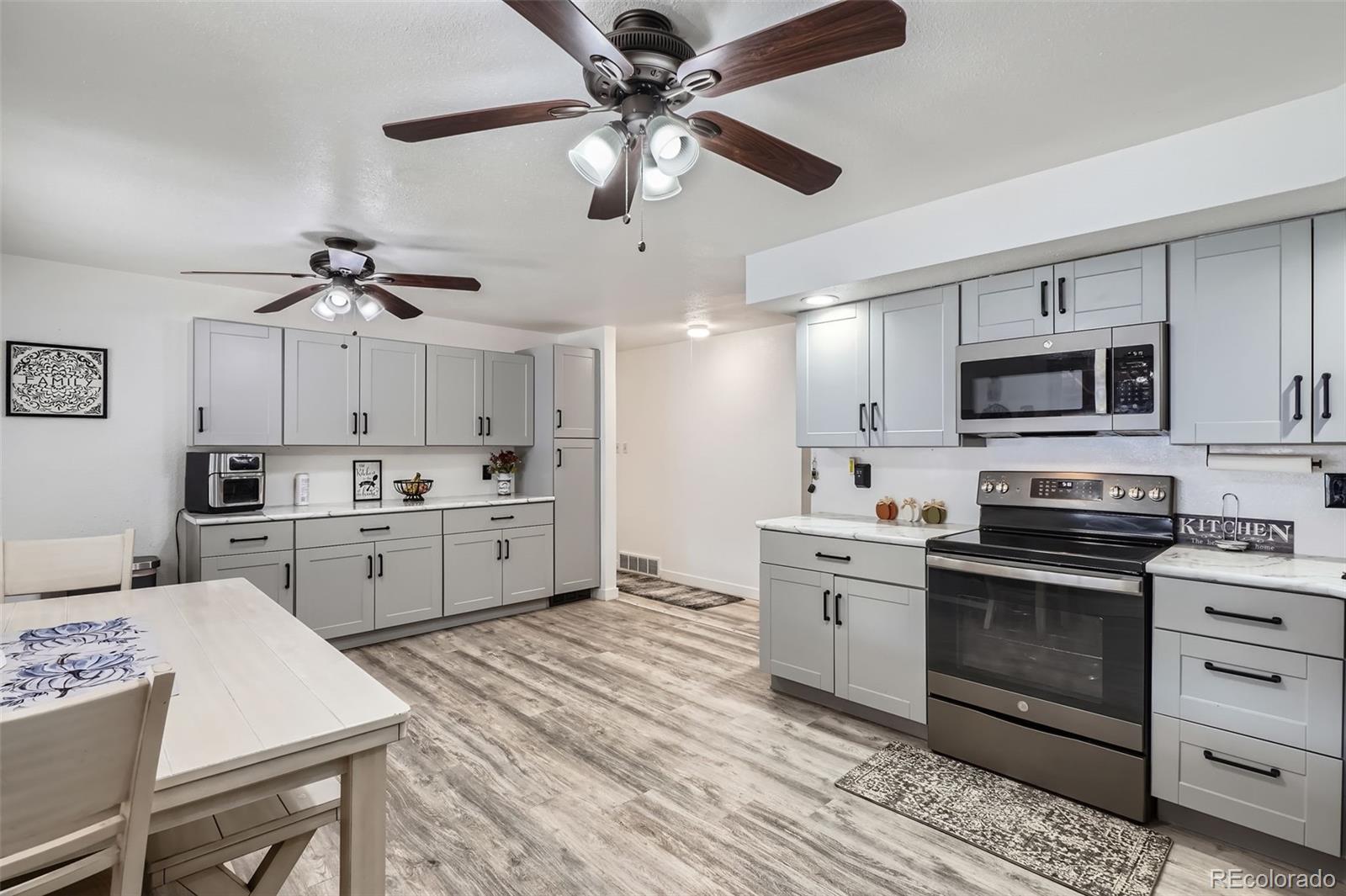 Lamar Heights Arvada Home | MLS #: 61656316761  Harlan Street, Arvada Beds: 4 Baths: 3 Price: $485,000