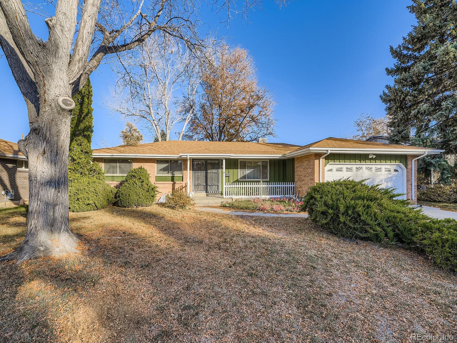 Harvey Park Denver Home | MLS #: 18063572142 S Harlan Street, Denver Beds: 3 Baths: 3 Price: $525,000