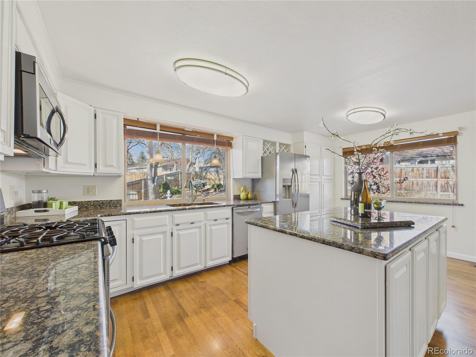 Pomona Lakes Arvada Home | MLS #: 75003948373  Zephyr Street, Arvada Beds: 3 Baths: 3 Price: $625,000