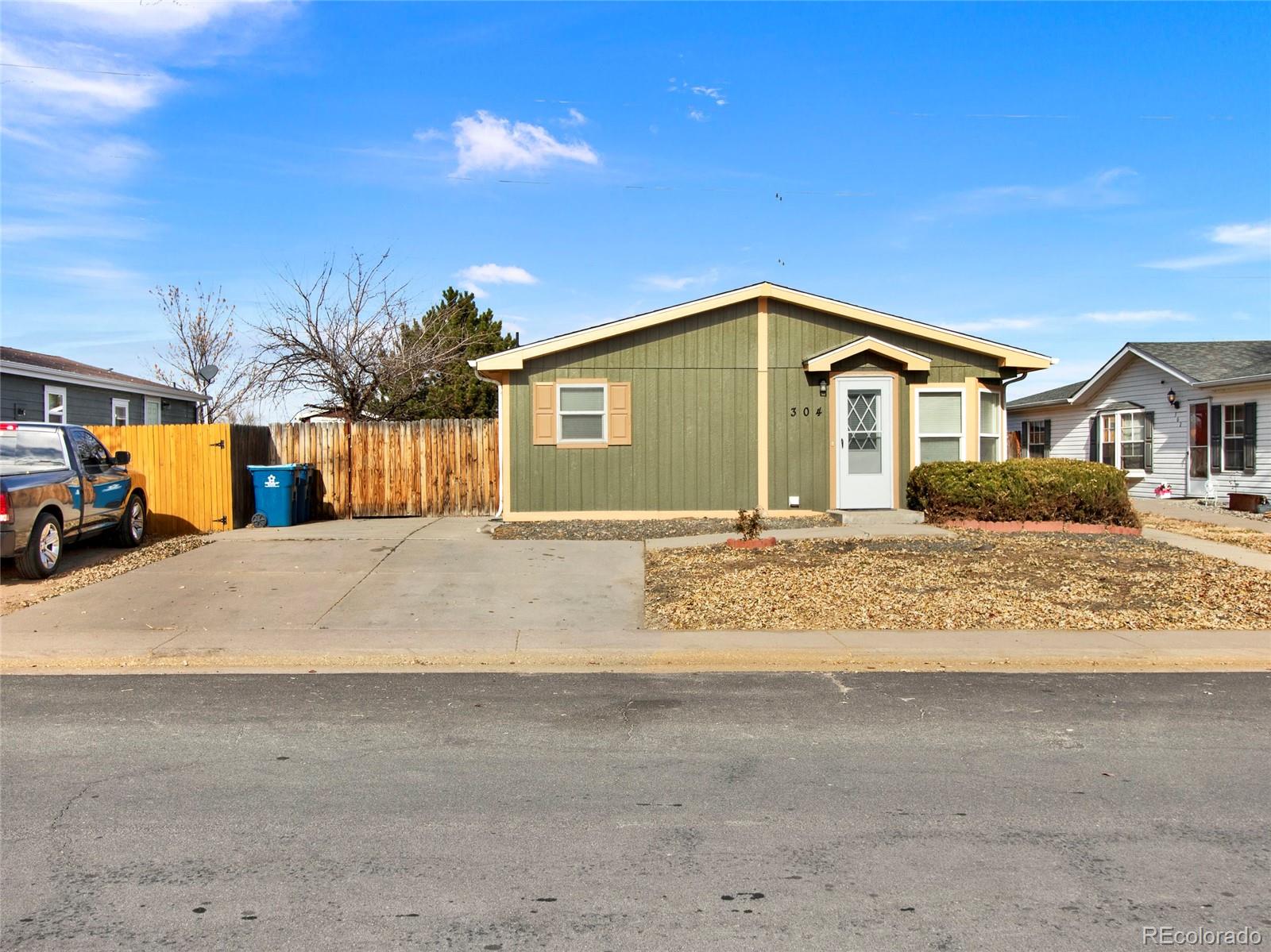 Lochwood Lochbuie Home | MLS #: 8819902304  Locust Avenue, Lochbuie Beds: 3 Baths: 2 Price: $330,000