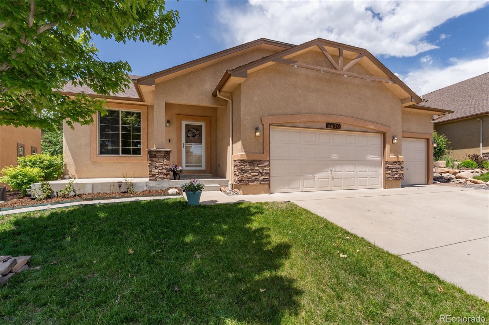 Oaks Colorado Springs Home | MLS #: 91532854410  Campus Bluff Court, Colorado Springs Beds: 5 Baths: 3 Price: $615,000