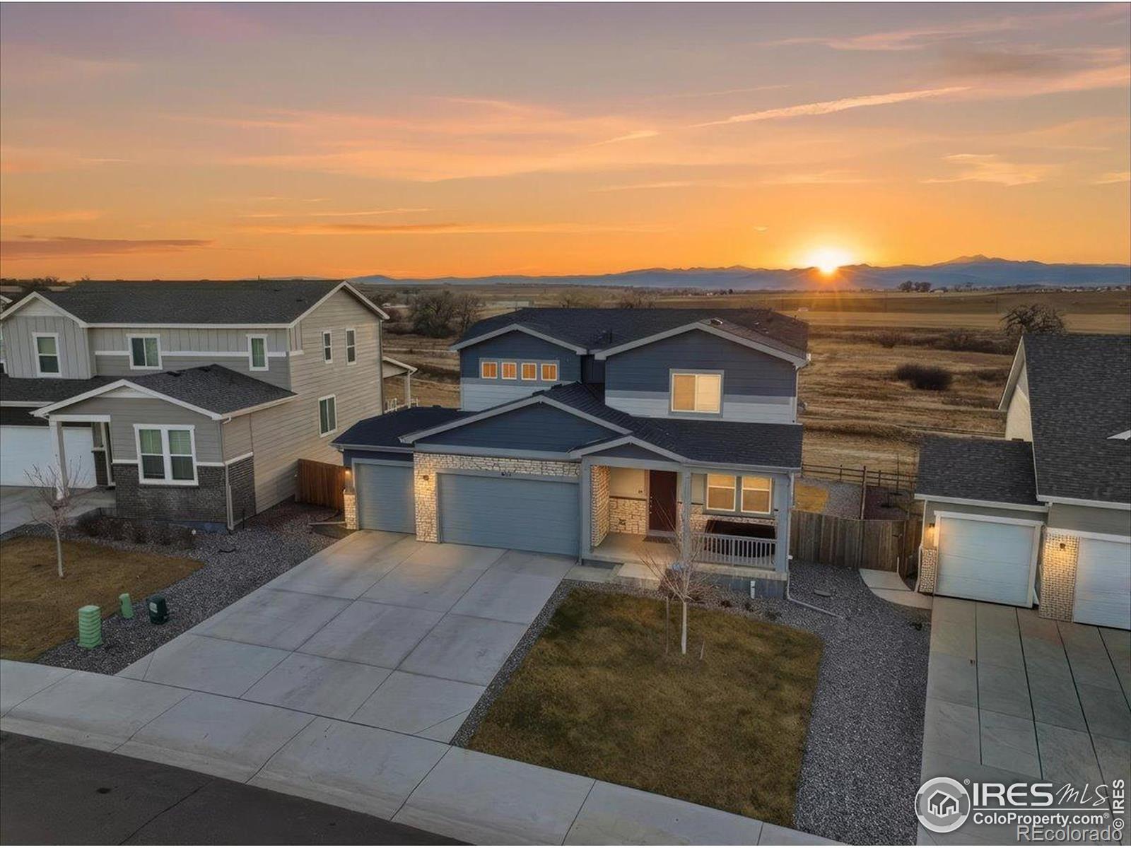 Johnstown Home | MLS #: 4567891048185632  Crestone Street, Johnstown Beds: 4 Baths: 3 Price: $525,000
