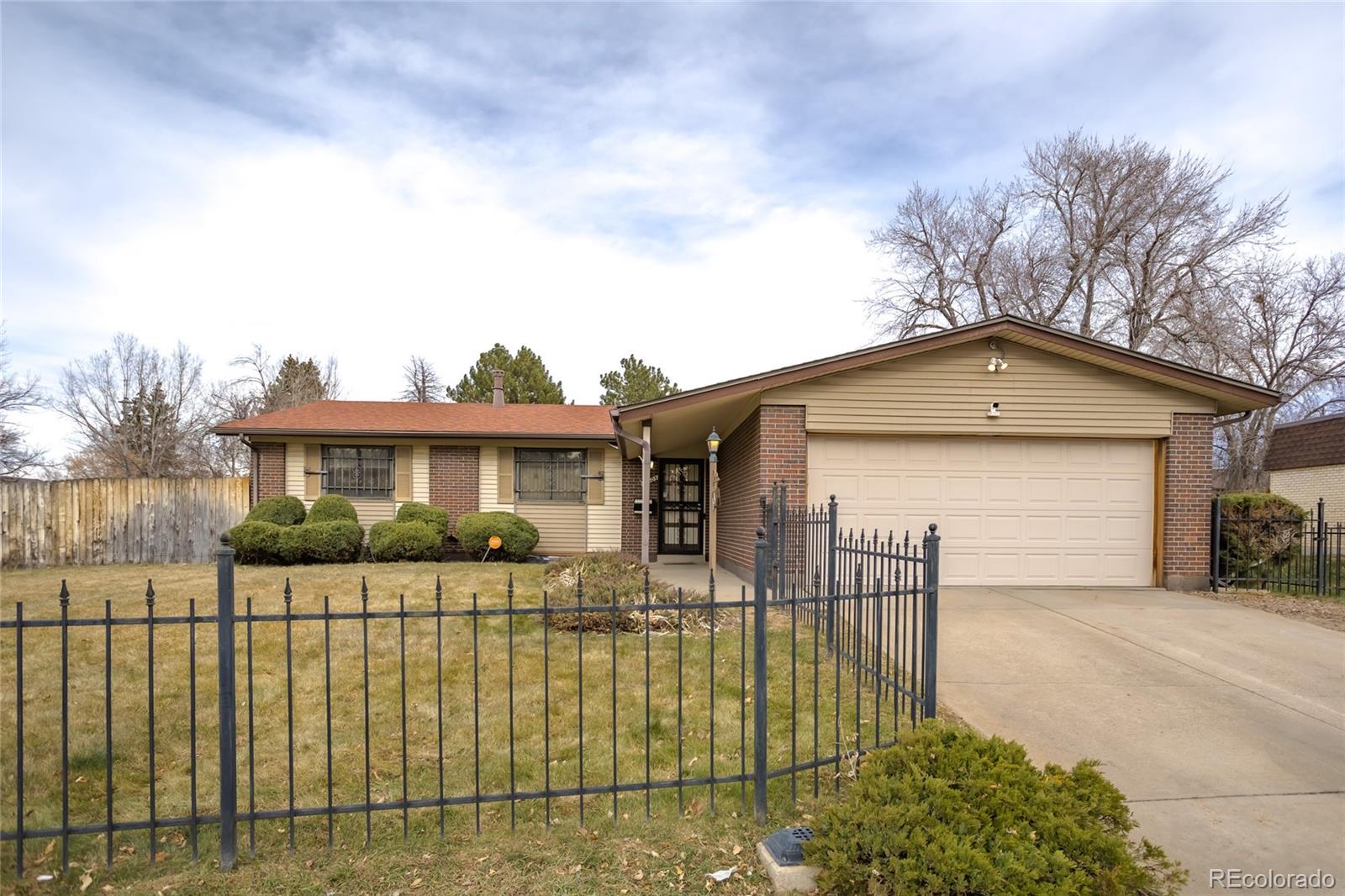 Montbello Denver Home | MLS #: 680836512305 E 54th Avenue Drive, Denver Beds: 4 Baths: 3 Price: $480,000