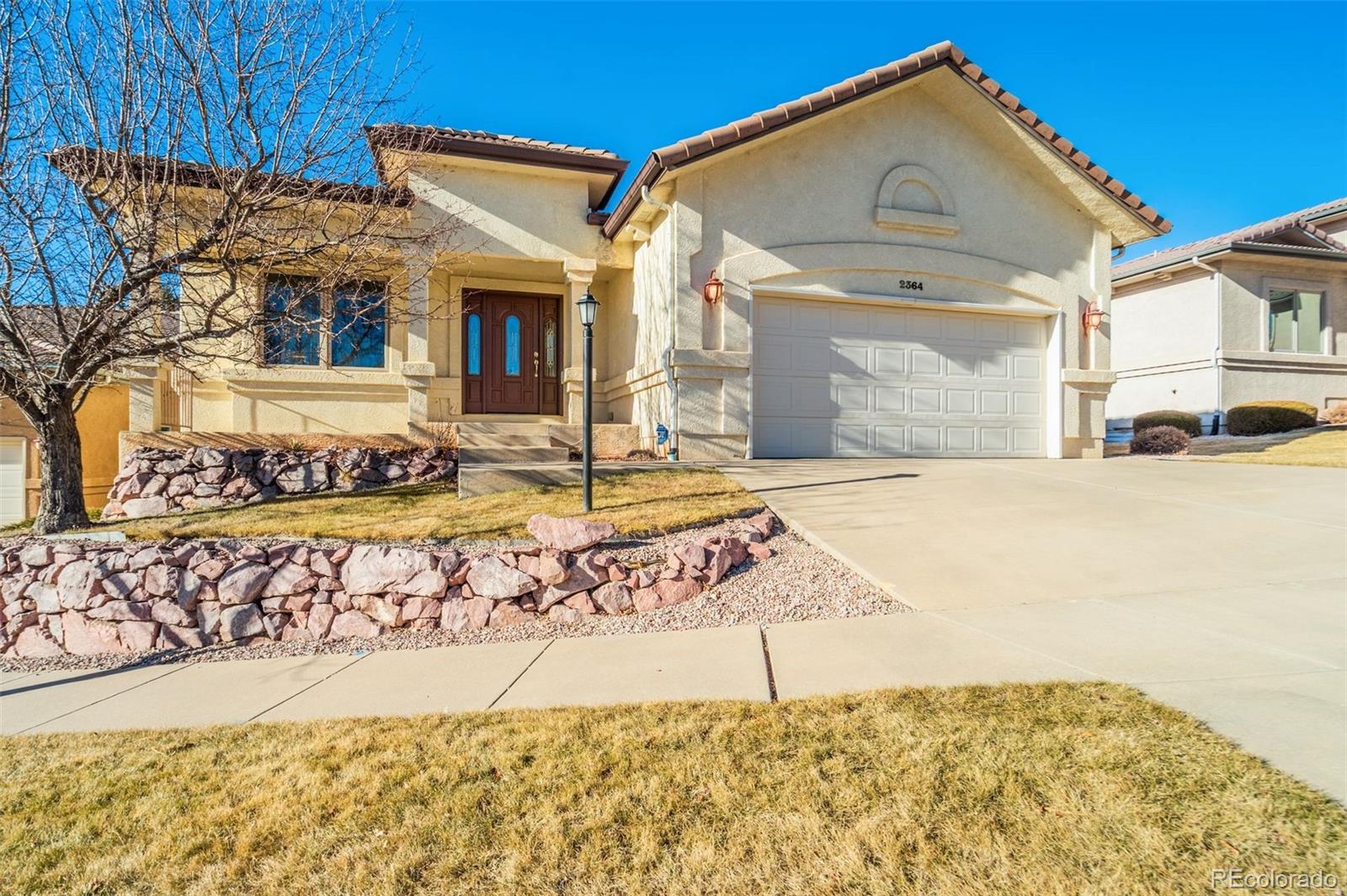Pine Creek Colorado Springs Home | MLS #: 76664442364  Spanish Oak Terrace, Colorado Springs Beds: 3 Baths: 3 Price: $650,000