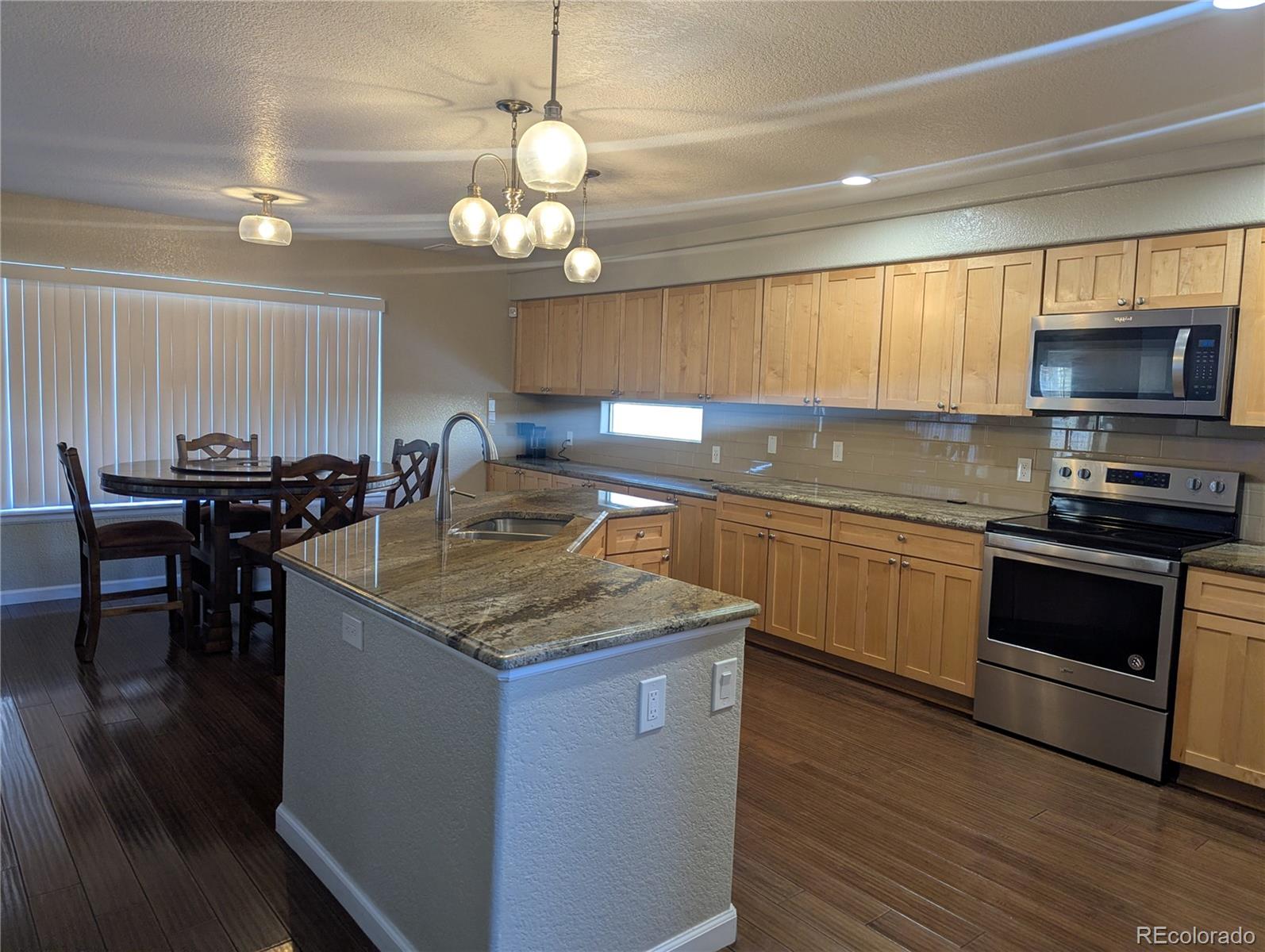 Green Valley Ranch Denver Home | MLS #: 69643834153  Orleans Court, Denver Beds: 4 Baths: 3 Price: $485,900