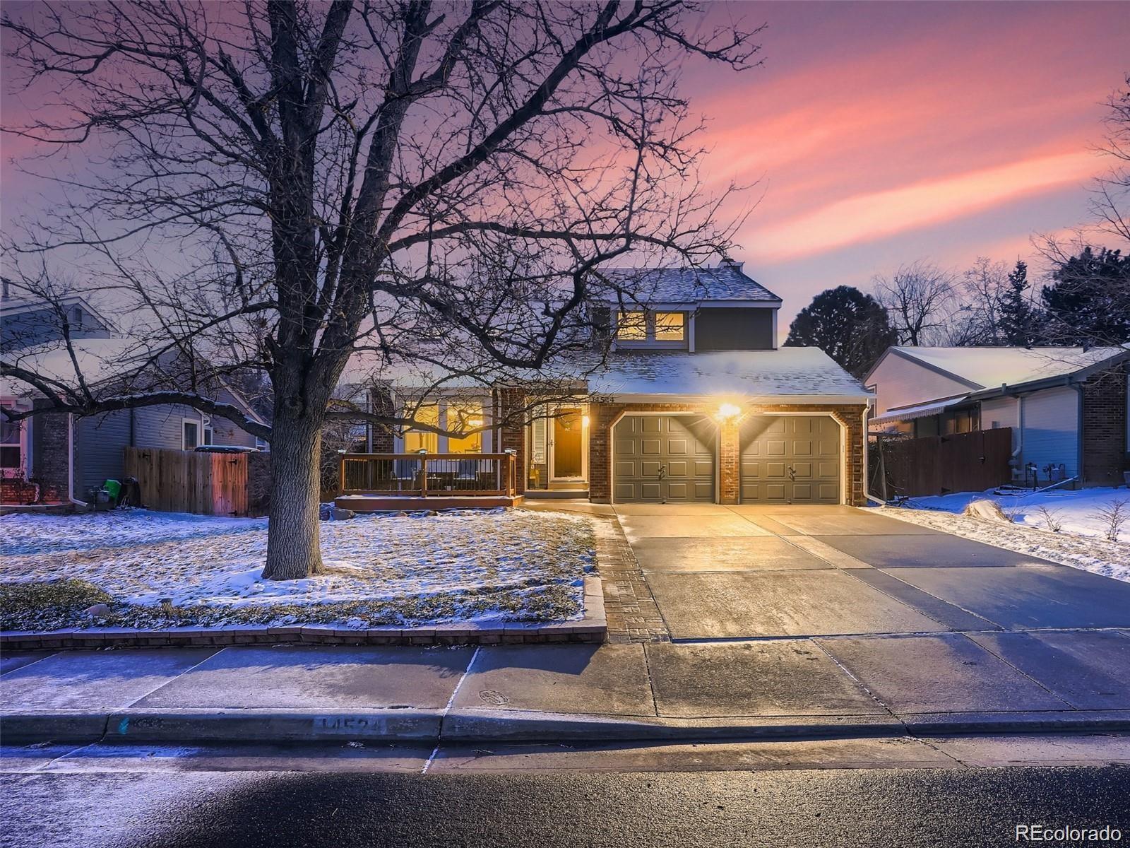 Woodgate Aurora Home | MLS #: 992471014524 E Wagon Trail Drive, Aurora Beds: 4 Baths: 4 Price: $609,000