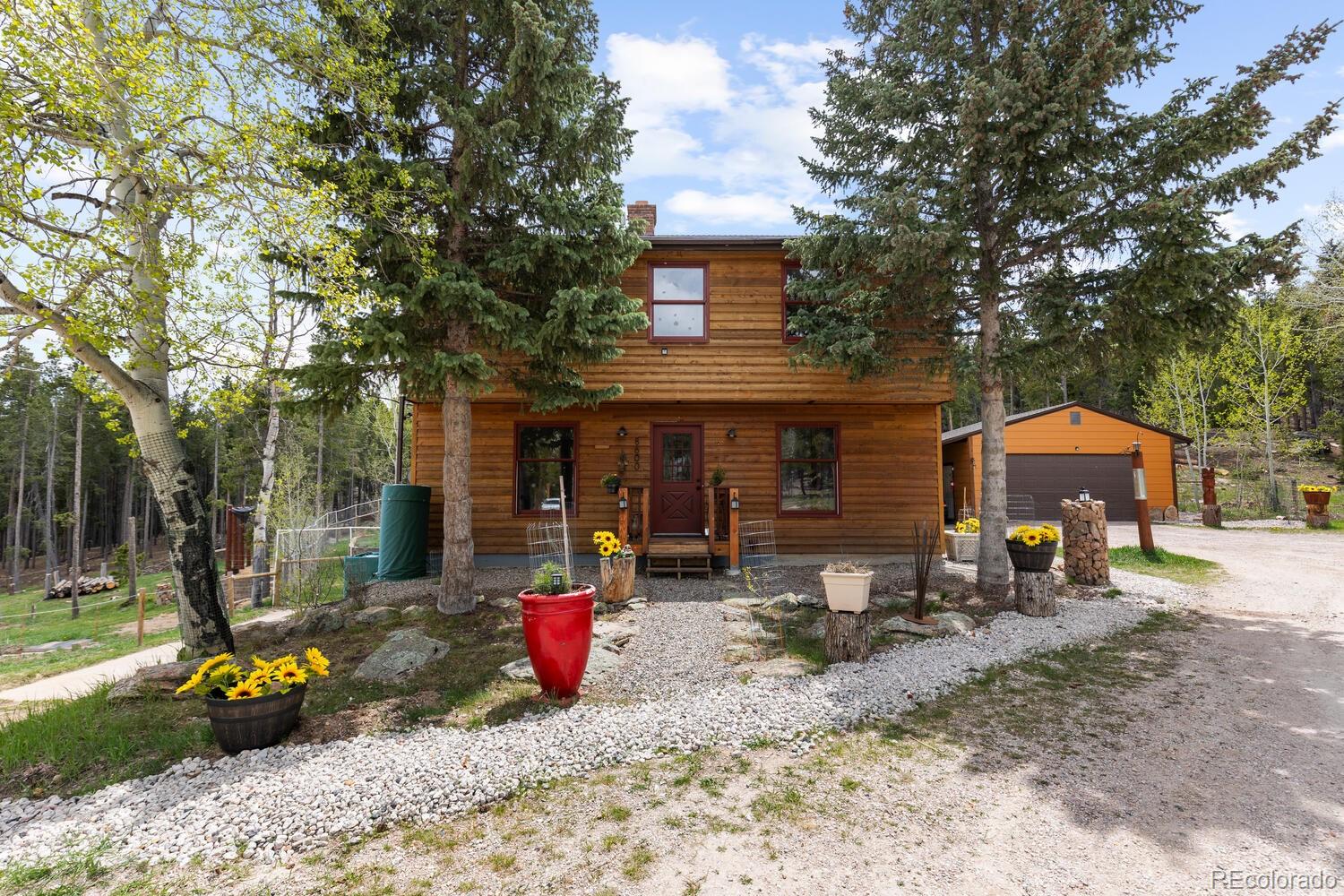  Conifer Home | MLS #: 47779438600 S Warhawk Road, Conifer Beds: 4 Baths: 3 Price: $815,000