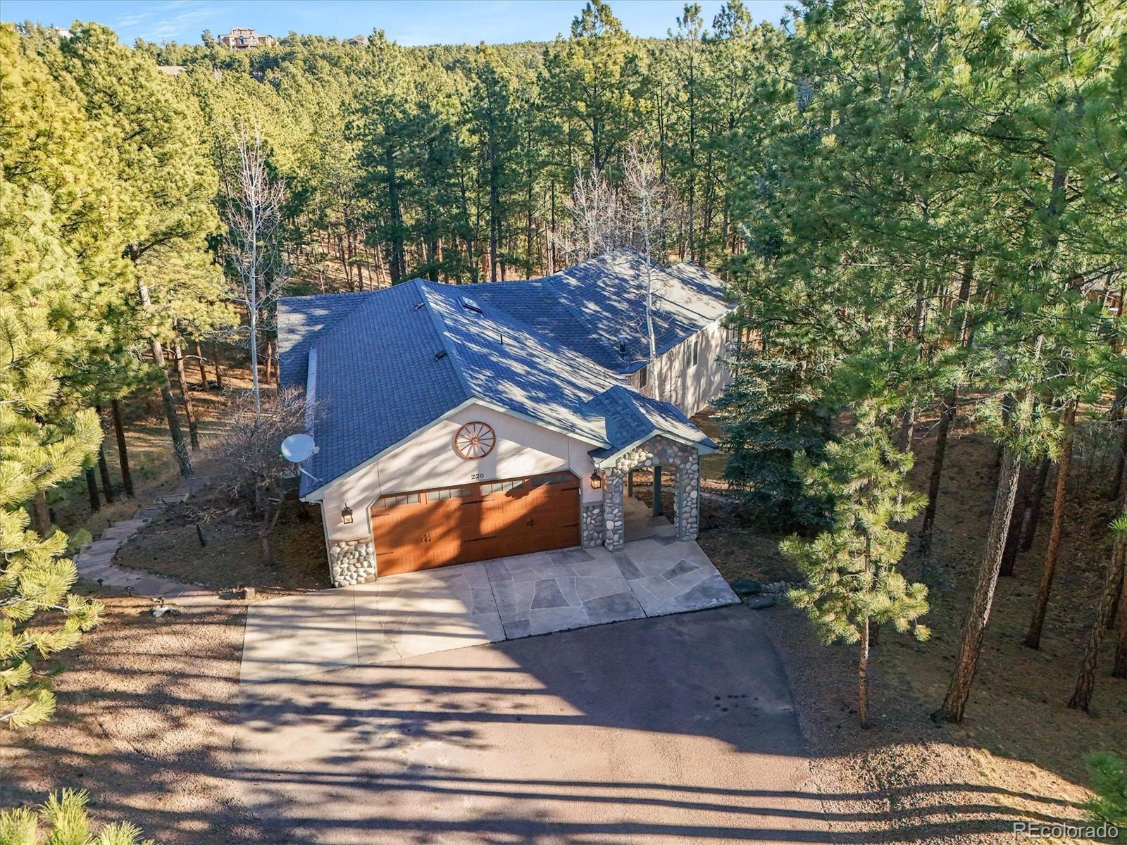 Woodmoor Monument Home | MLS #: 6074642220  Cobblestone Way, Monument Beds: 5 Baths: 4 Price: $725,000