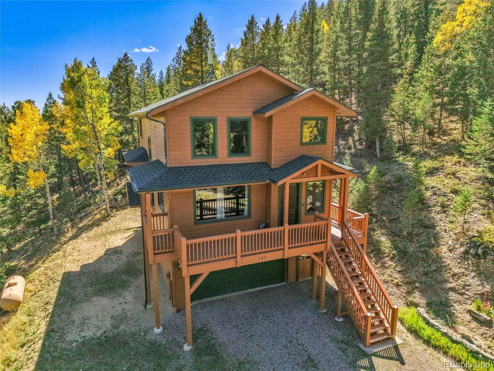  Evergreen Home | MLS #: 9837556191  Blue Spruce Drive, Evergreen Beds: 3 Baths: 4 Price: $895,000
