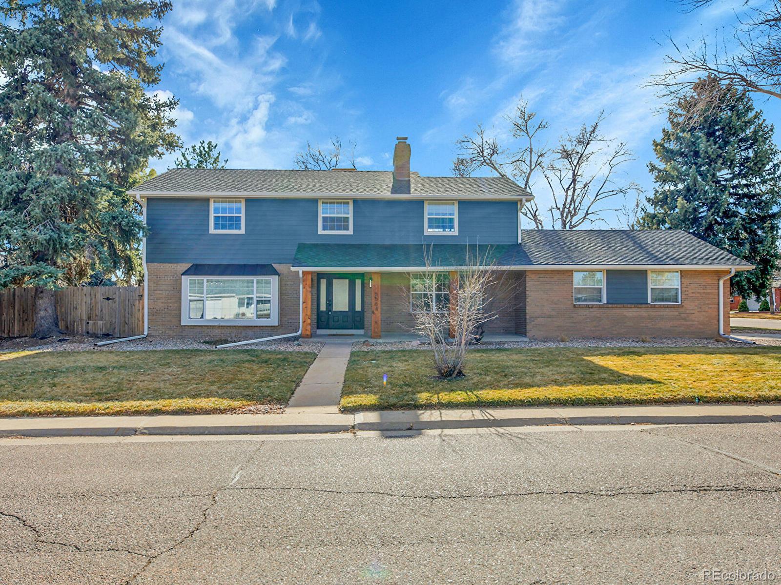 Columbine Knolls Littleton Home | MLS #: 69740655584 W Rowland Place, Littleton Beds: 4 Baths: 3 Price: $815,000