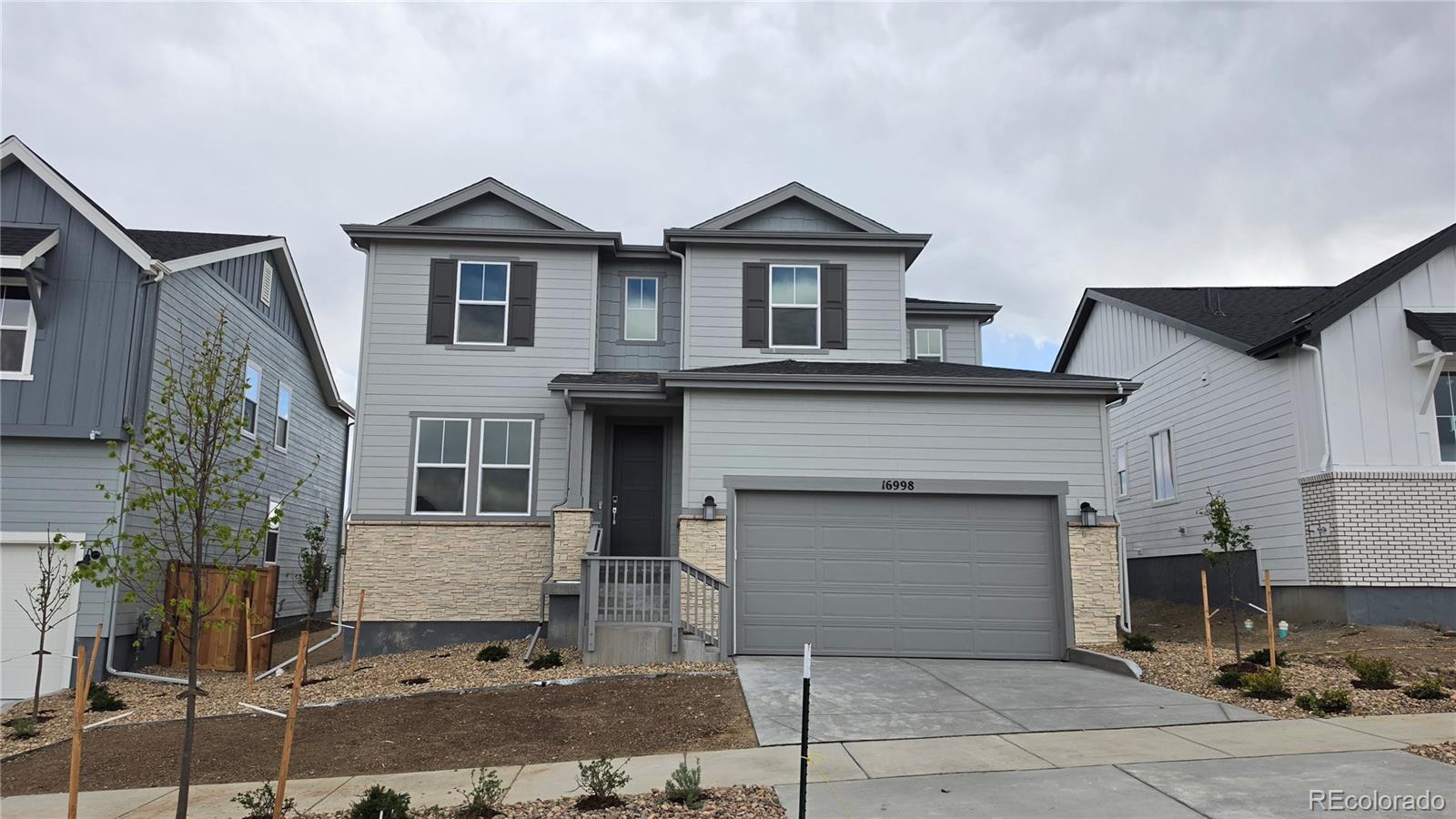 Trailstone Arvada Home | MLS #: 176829916998 W 92nd Drive, Arvada Beds: 4 Baths: 3 Price: $883,549