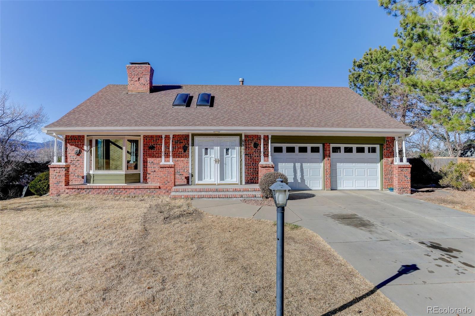 Huntington Heights Arvada Home | MLS #: 42031956967  Dudley Drive, Arvada Beds: 5 Baths: 4 Price: $825,000