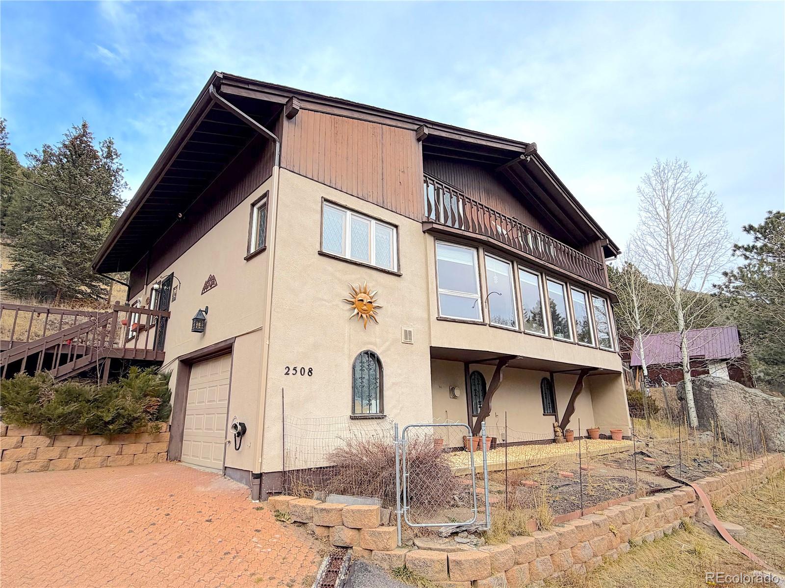  Evergreen Home | MLS #: 32958202508  Witter Gulch Road, Evergreen Beds: 3 Baths: 3 Price: $679,000