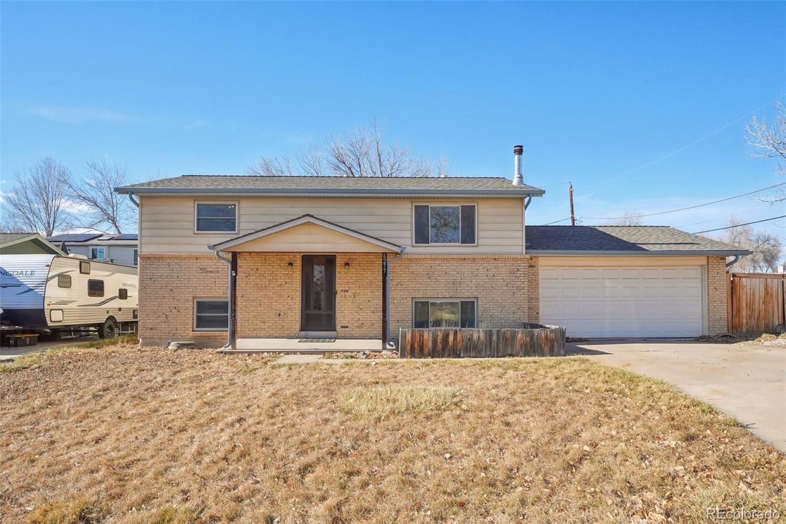  Arvada Home | MLS #: 63679556277  Reed Court, Arvada Beds: 4 Baths: 2 Price: $475,000