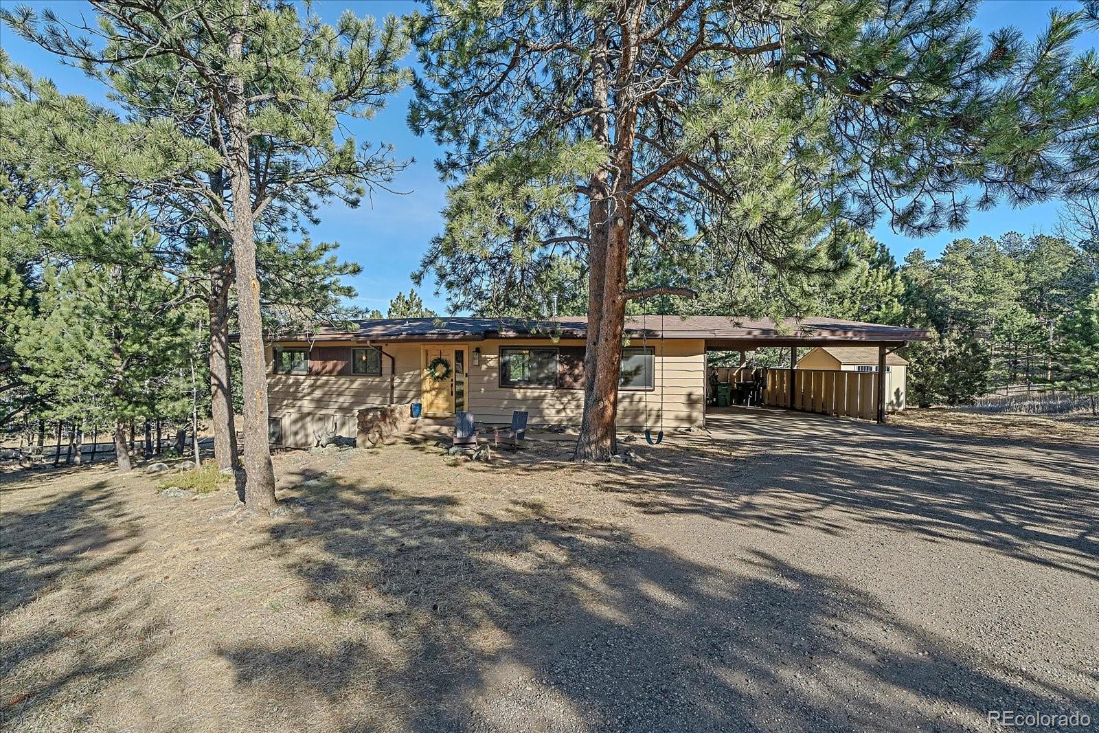 Hiwan Hills Evergreen Home | MLS #: 673571629793  Paint Brush Drive, Evergreen Beds: 4 Baths: 2 Price: $995,000