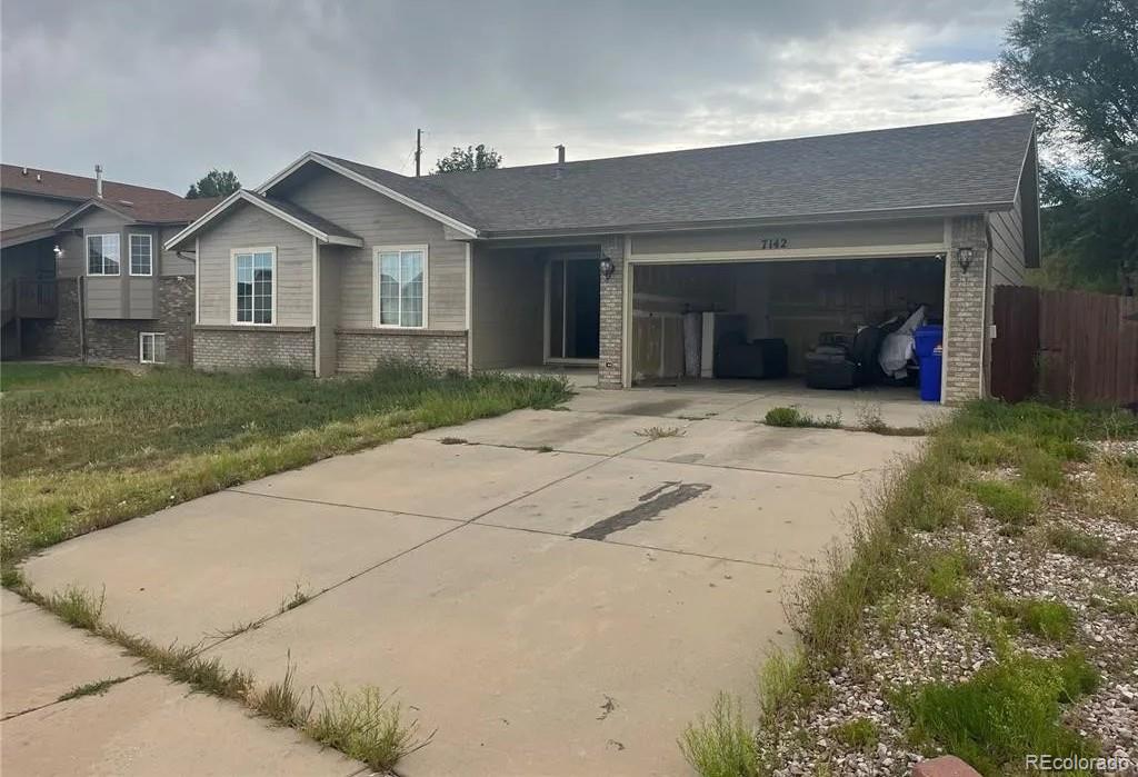 The Glen At Widefield Colorado Springs Home | MLS #: 97609537142  Lone Eagle Lane, Colorado Springs Beds: 5 Baths: 3 Price: $425,000