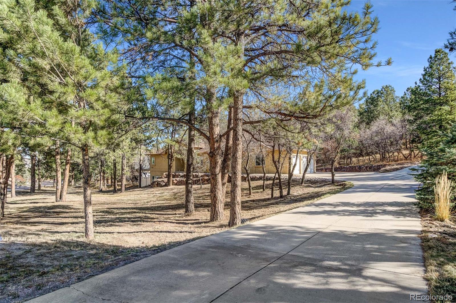 Oaks Colorado Springs Home | MLS #: 90155697405  Winding Oaks Drive, Colorado Springs Beds: 4 Baths: 3 Price: $964,000