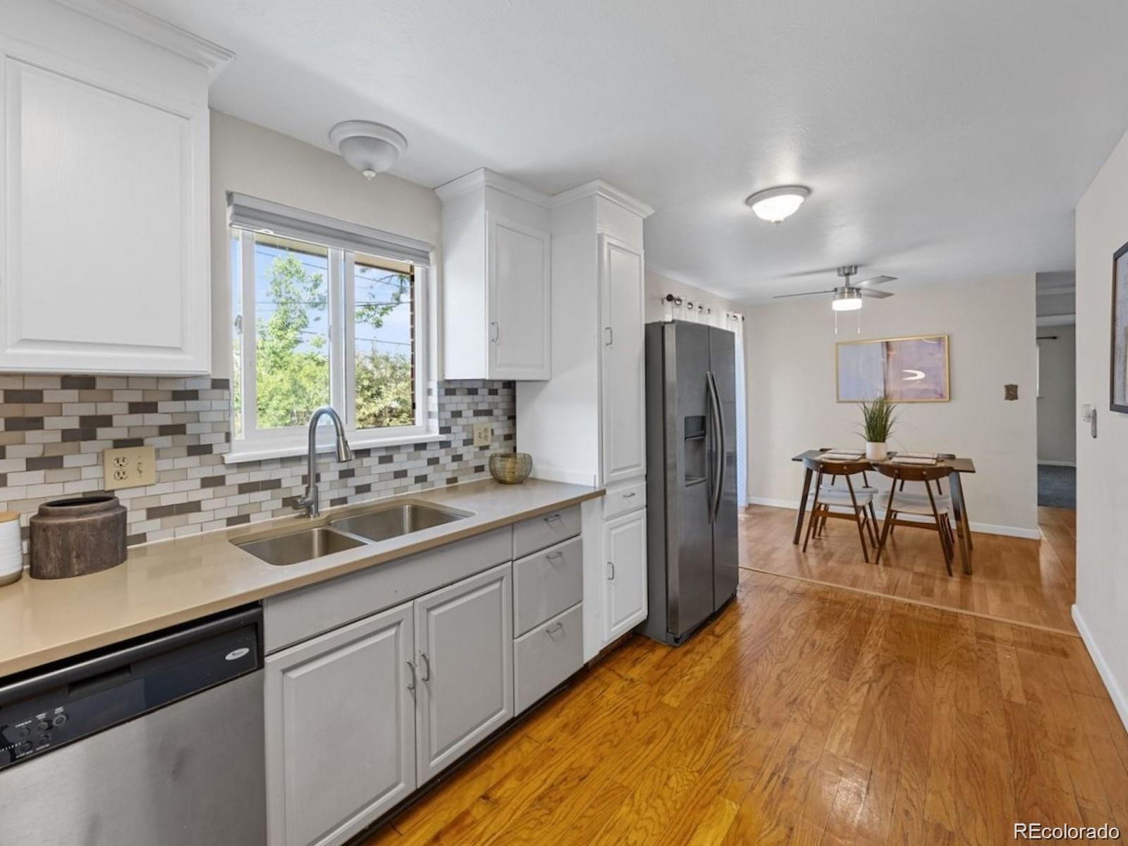 Sunnyvale Aurora Home | MLS #: 1879933403  Emporia Street, Aurora Beds: 6 Baths: 3 Price: $474,900