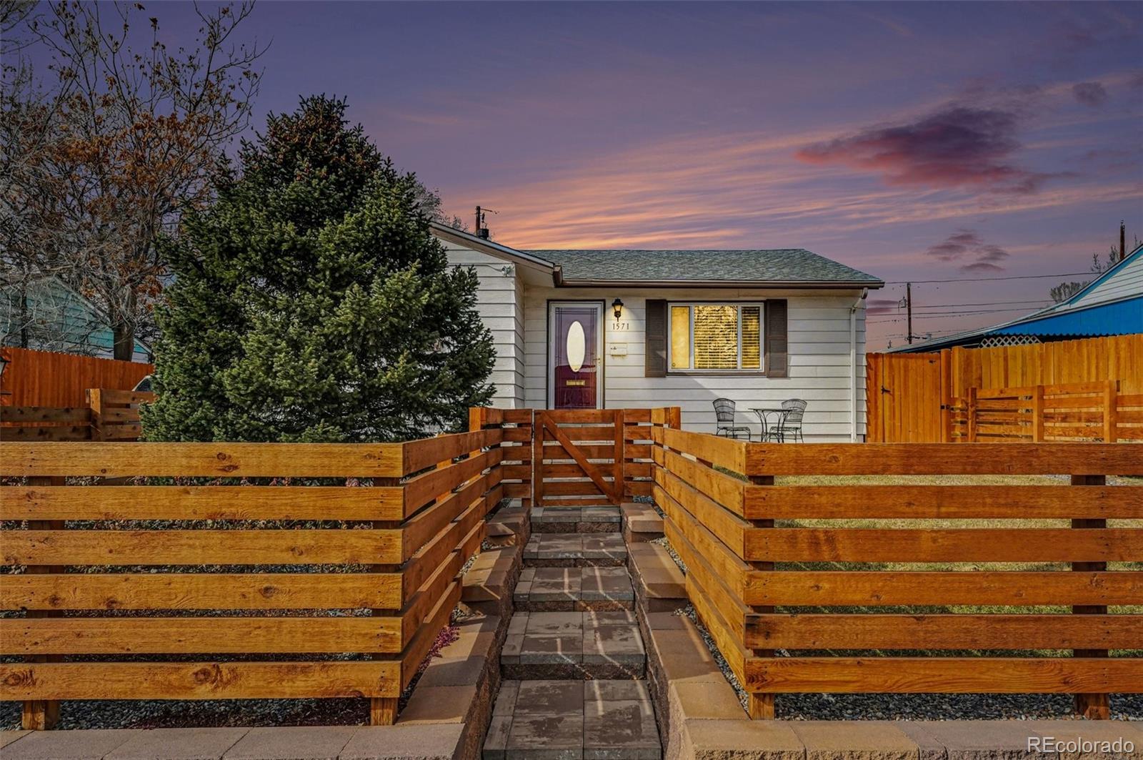 Ruby Hill Denver Home | MLS #: 95974661571 S Dale Court, Denver Beds: 4 Baths: 3 Price: $525,000